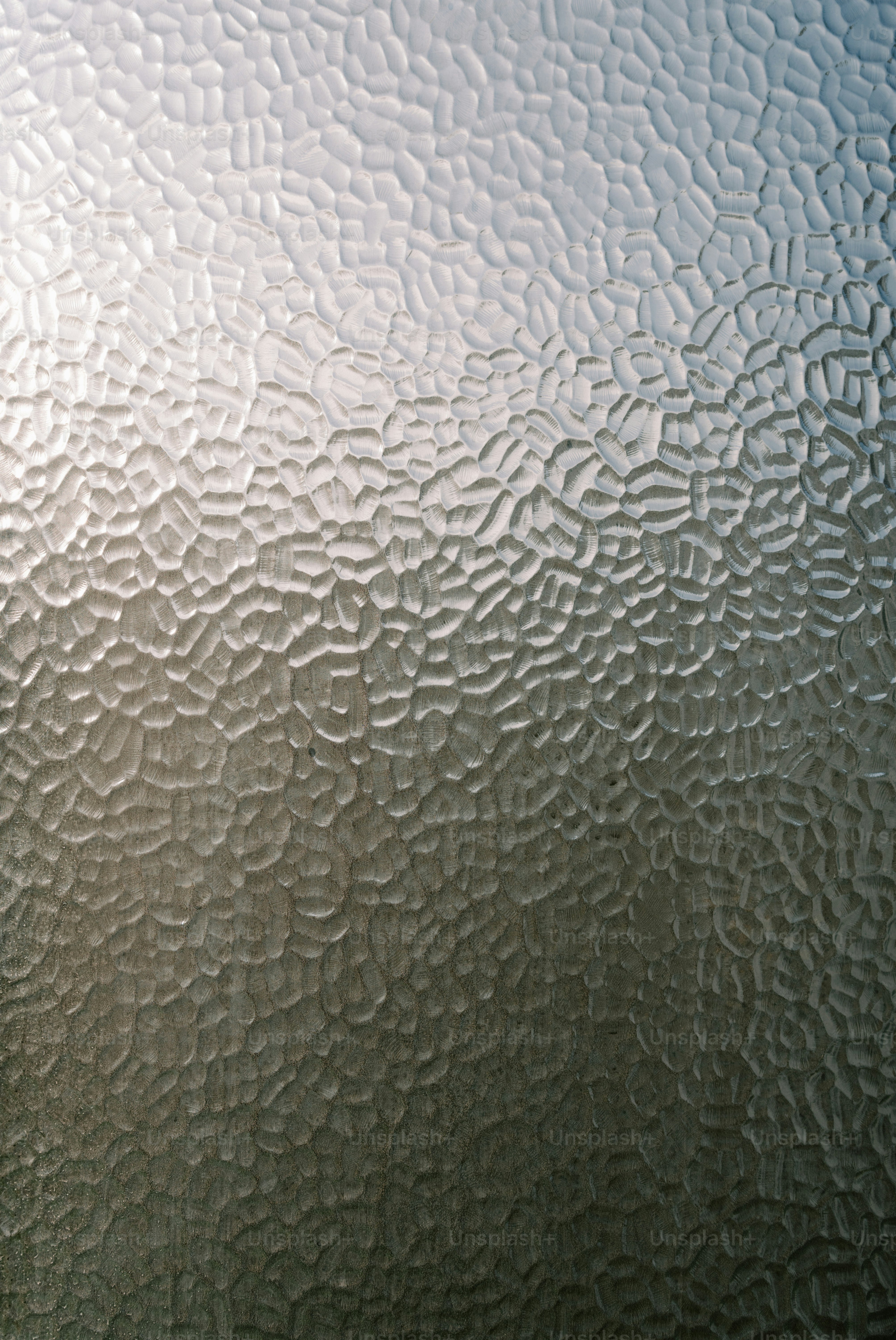 Textured frosted glass with a gradient light effect