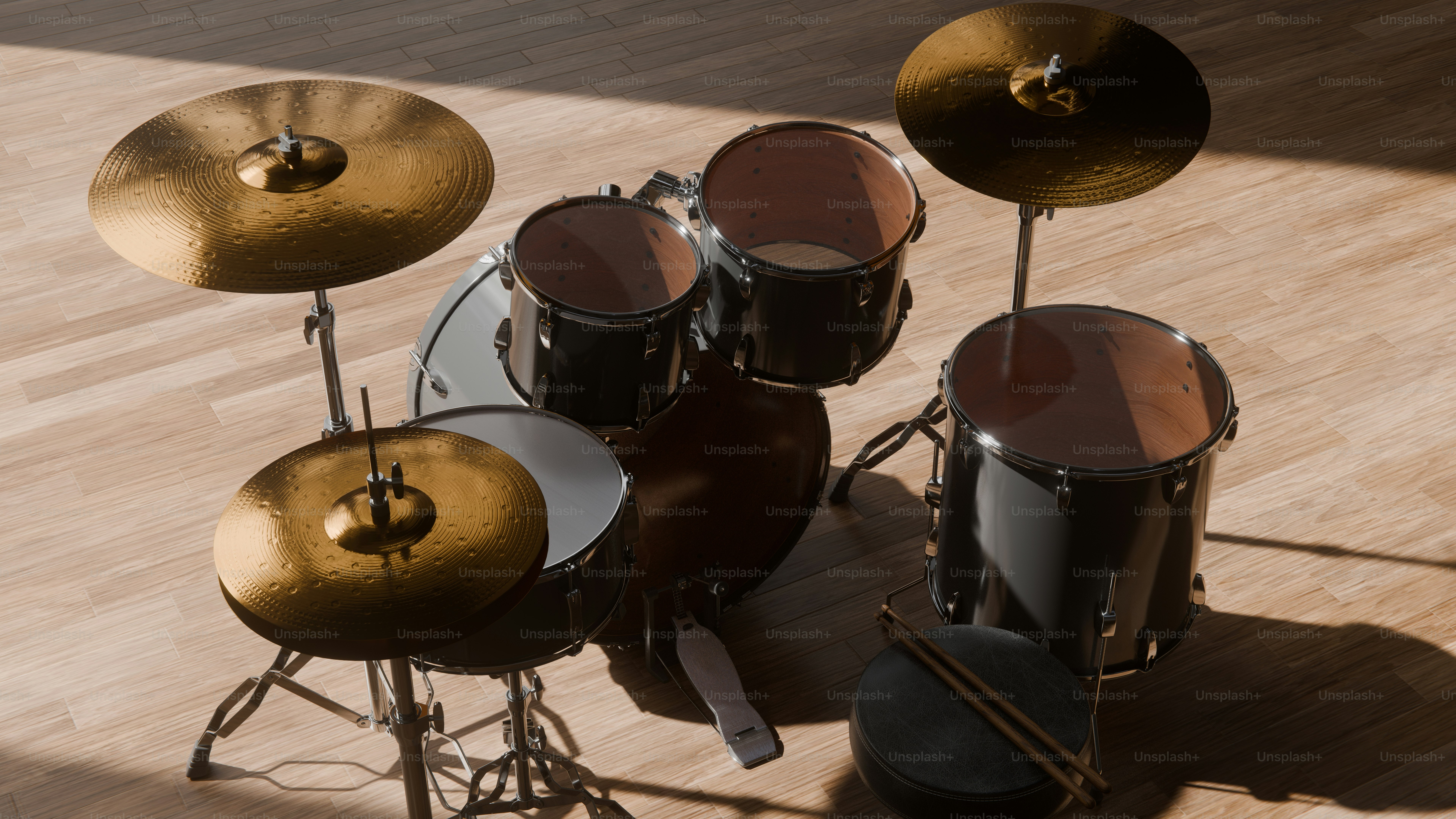 A drum set with cymbals and drumsticks