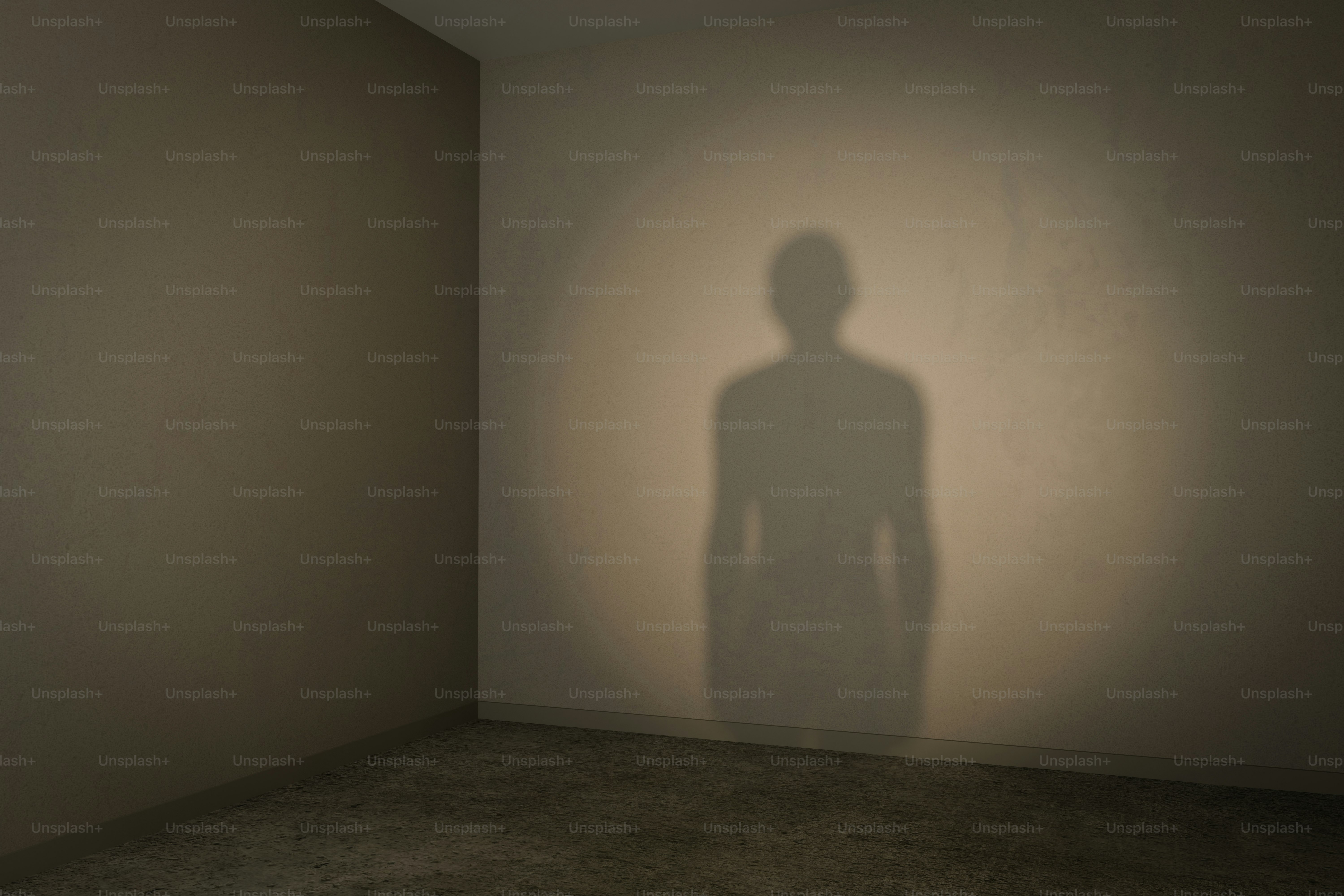 Sombra de uma pessoa na parede