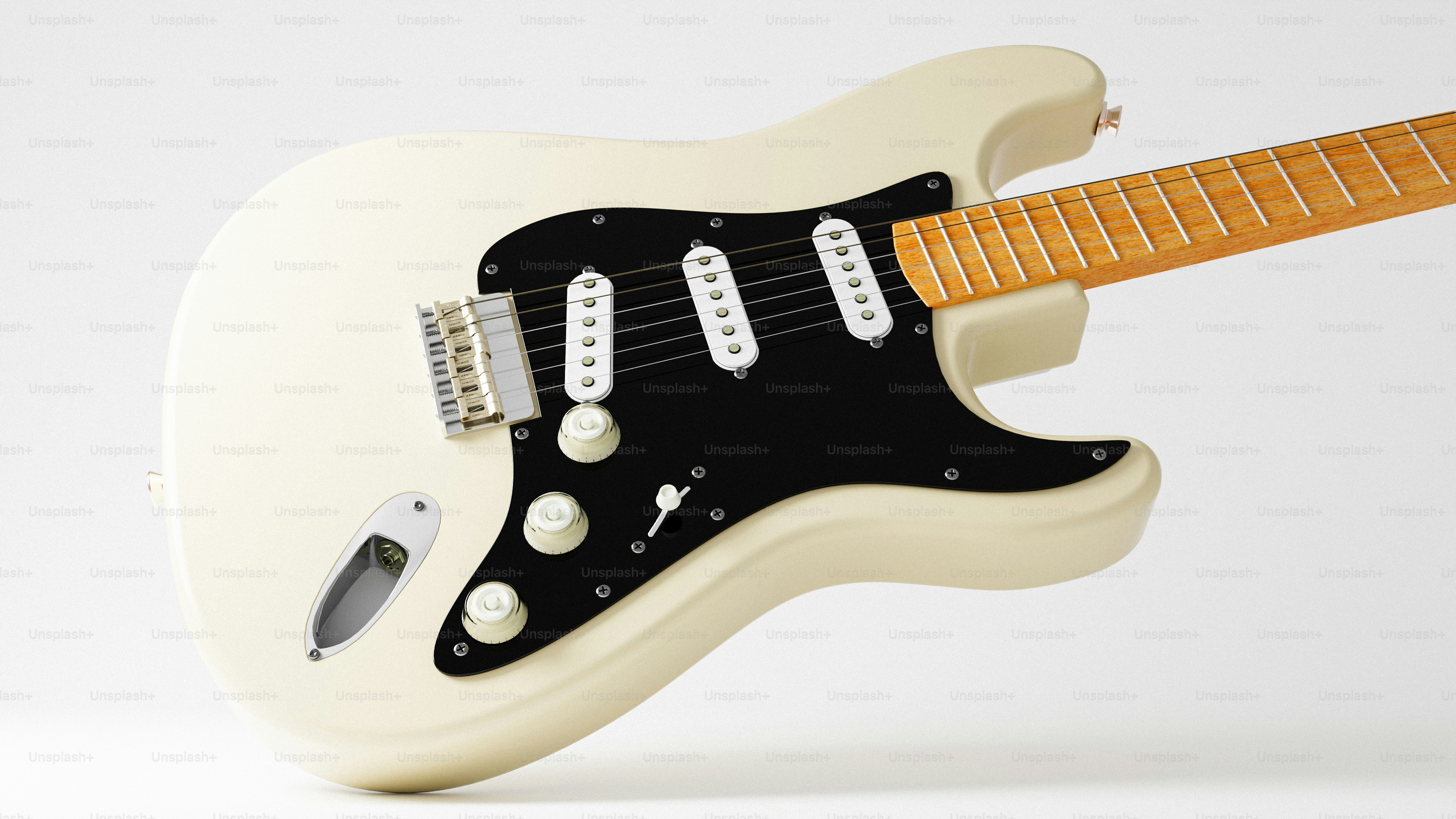 A white electric guitar with a black pickguard
