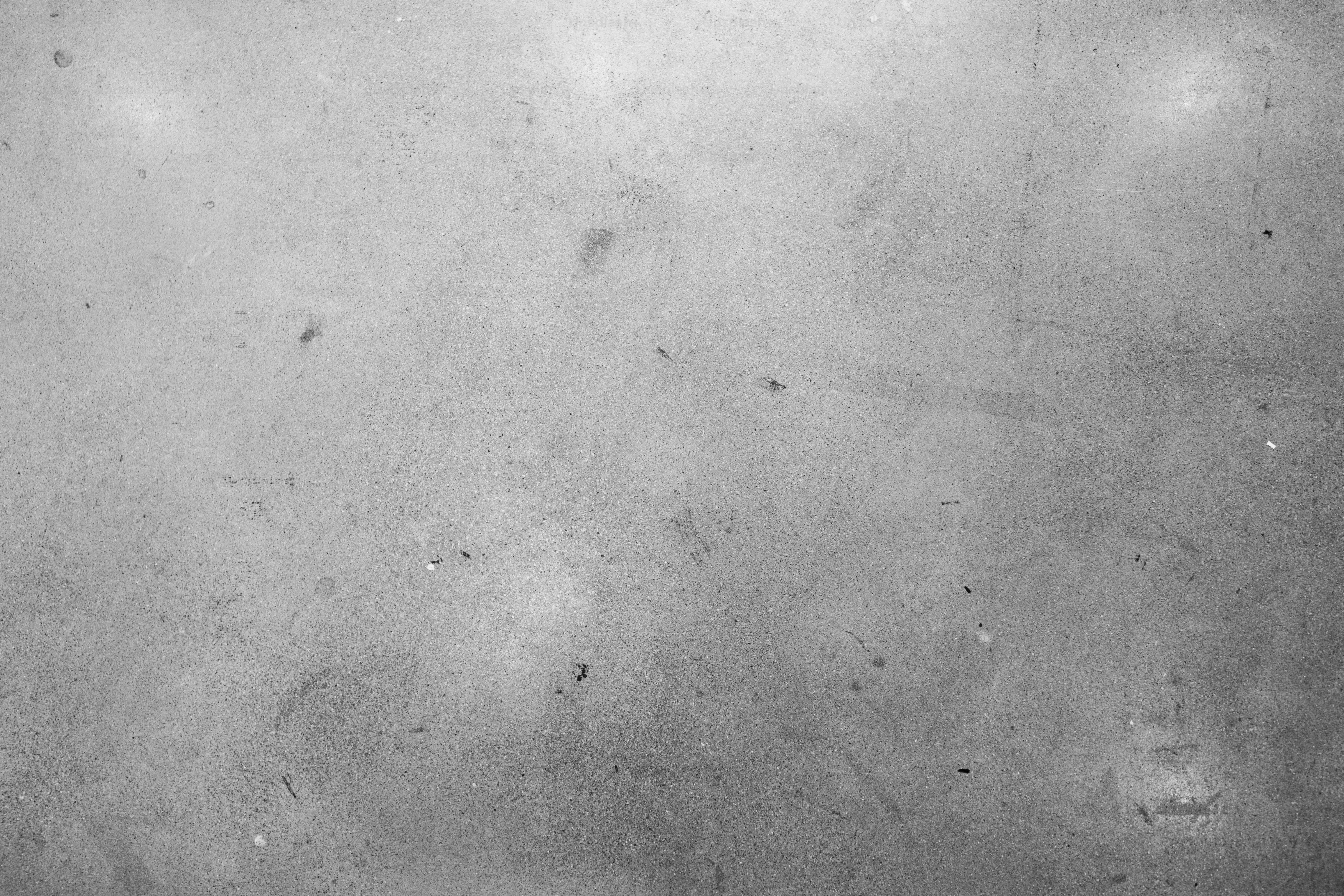 微妙な凹凸があるテクスチャーのある灰色の表面。
