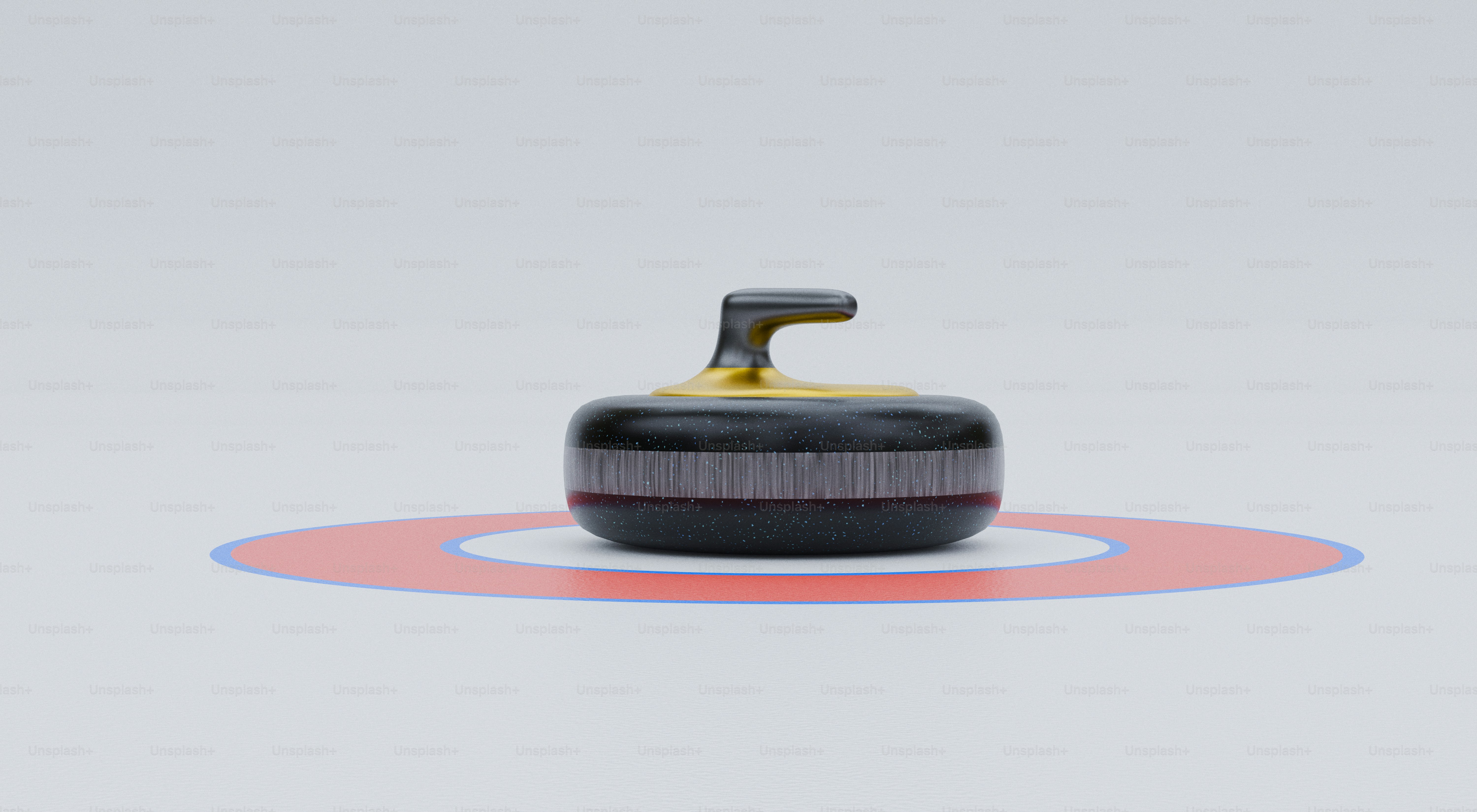 A curling stone rests on ice within a target.