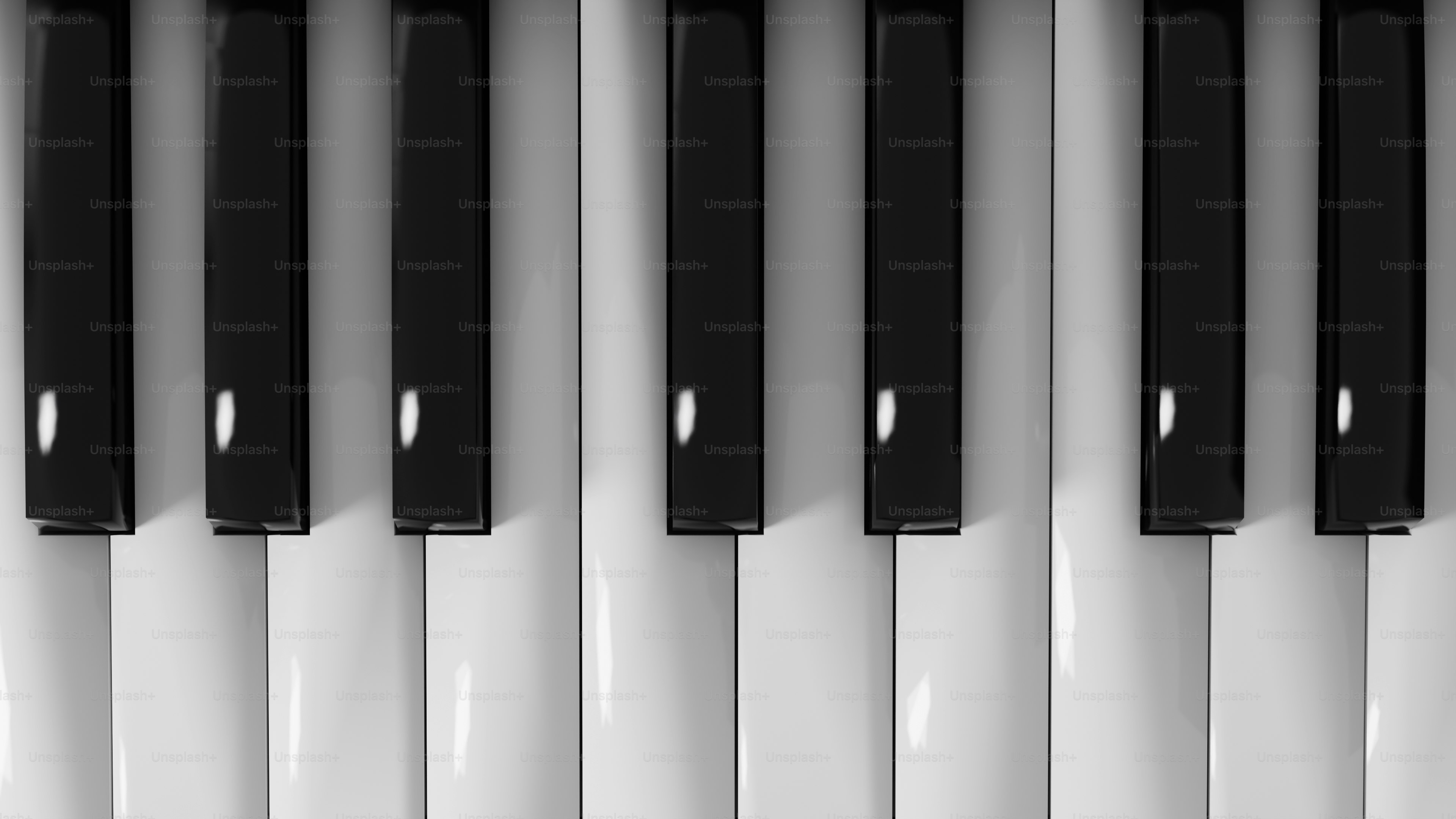 Close-up of piano keys in black and white.