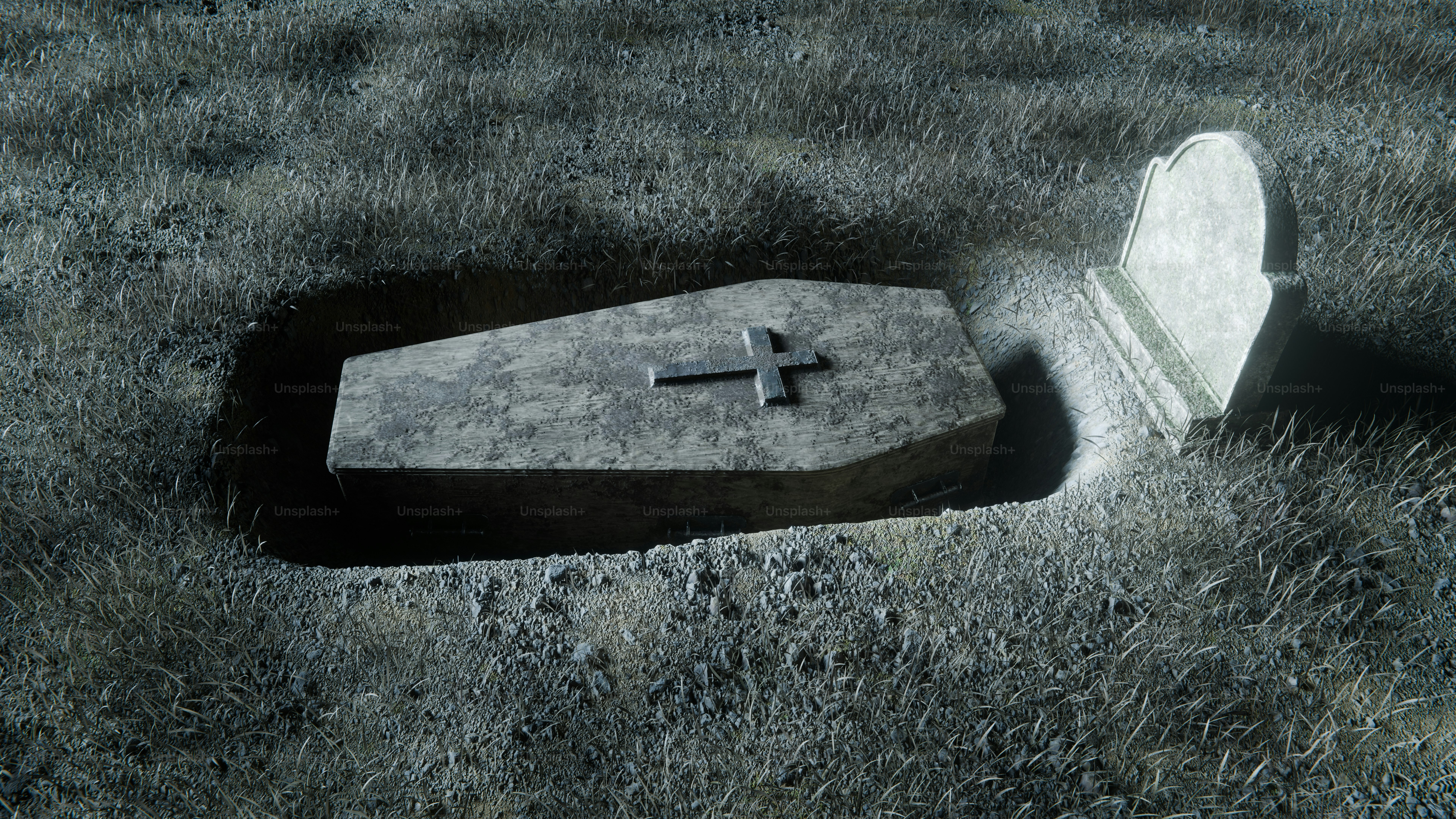 A stone coffin with a cross in a grave.