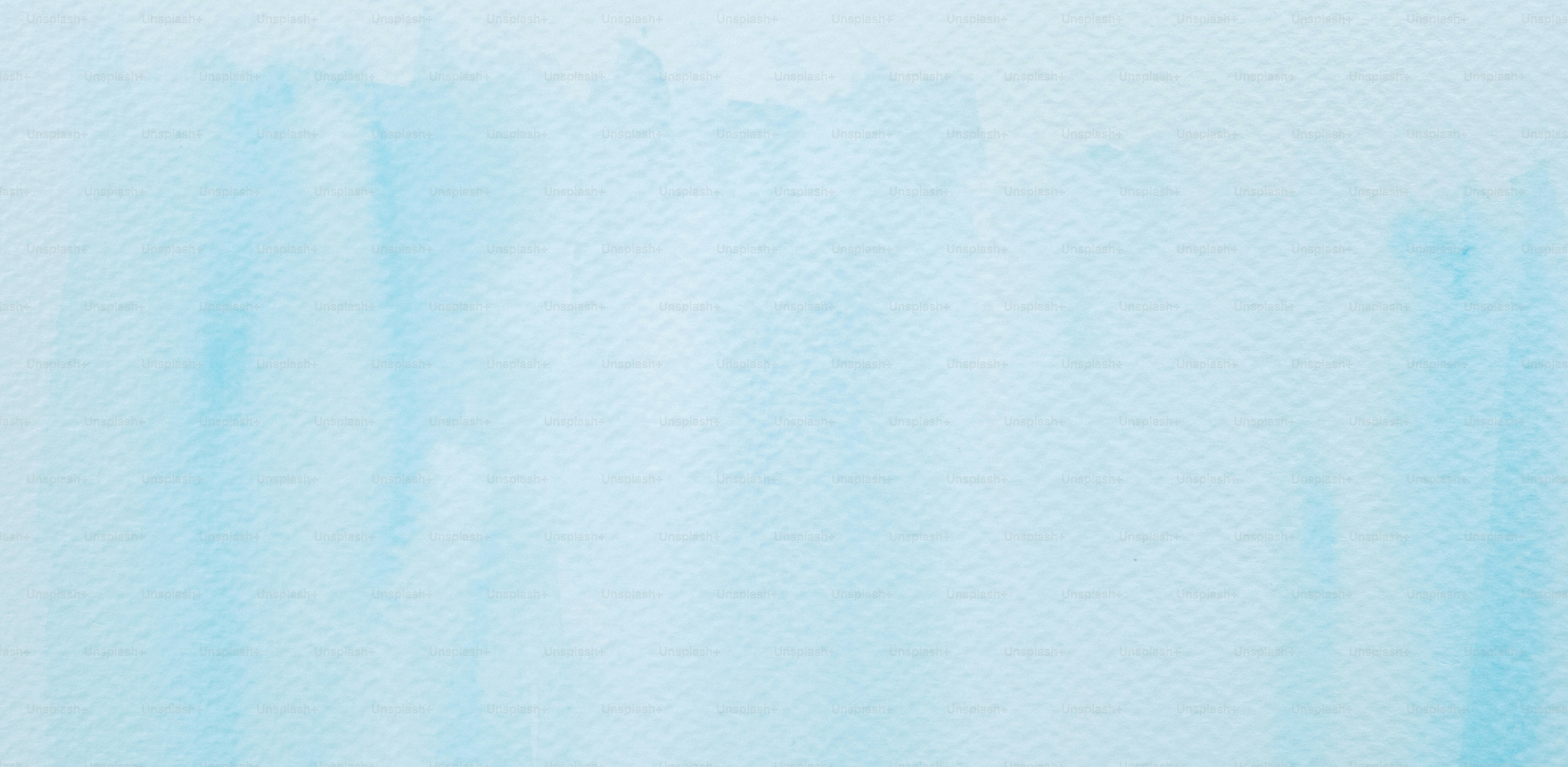 Soft blue watercolor wash background