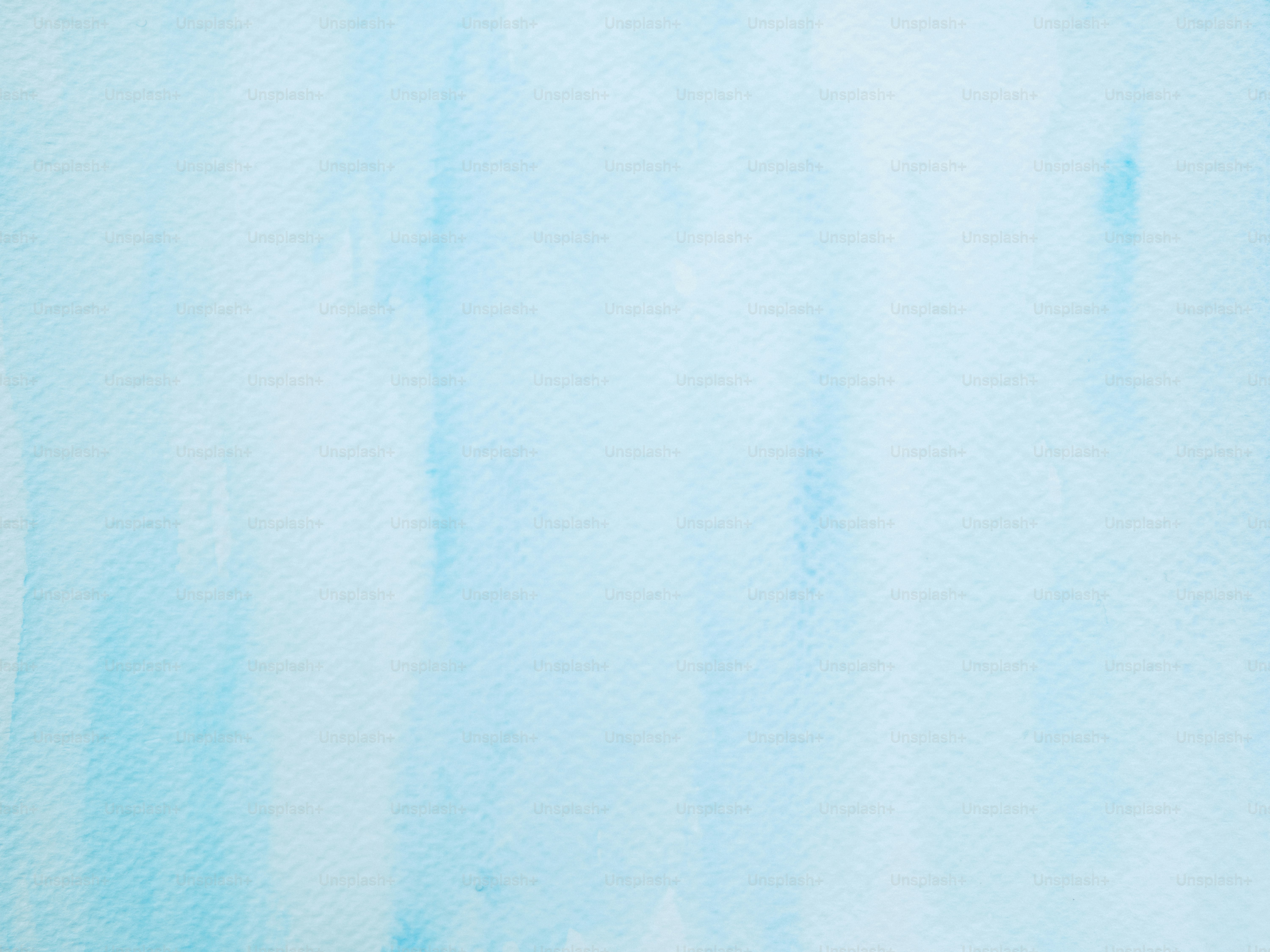 Soft blue watercolor wash background