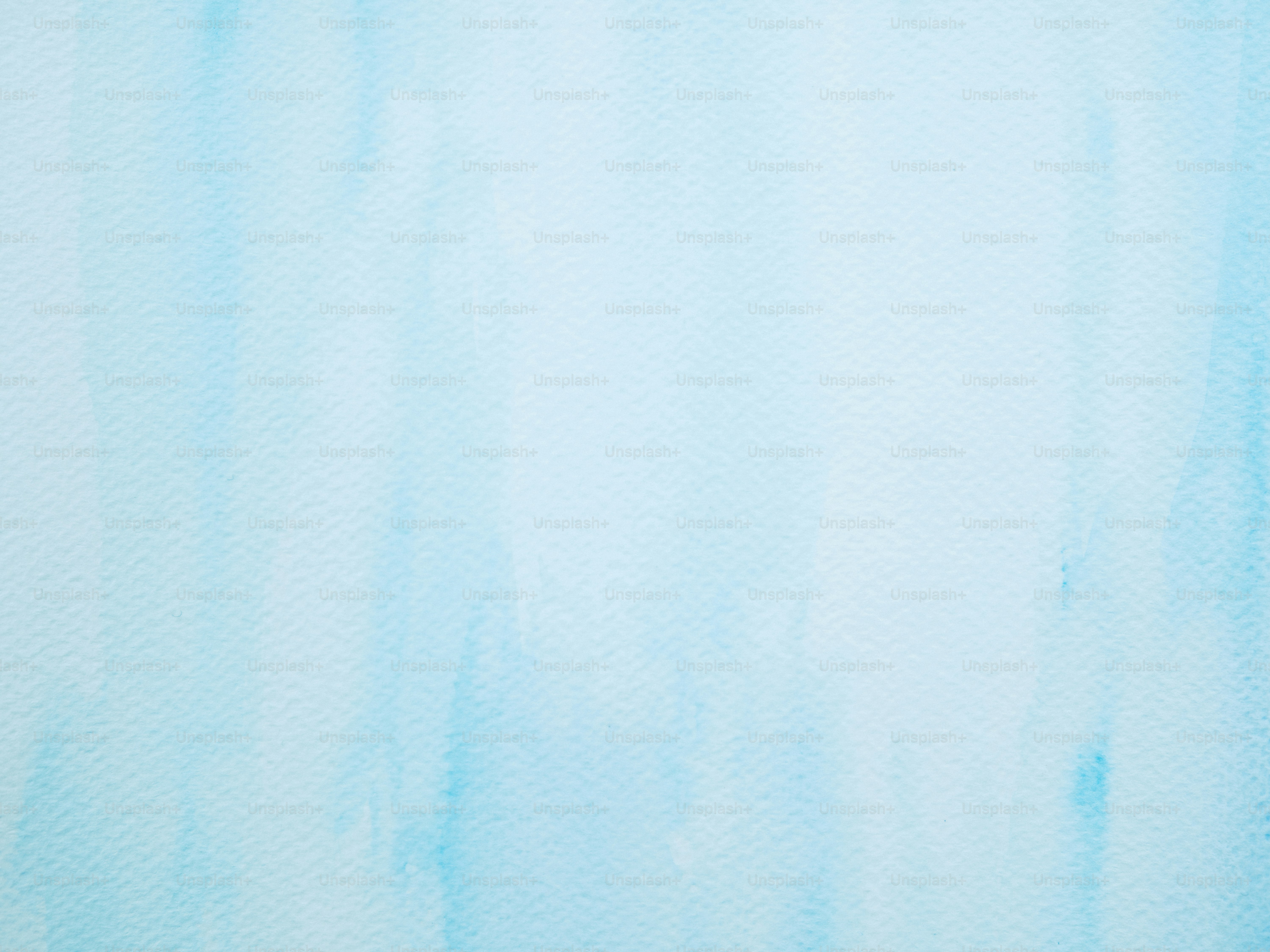 Soft blue watercolor wash background