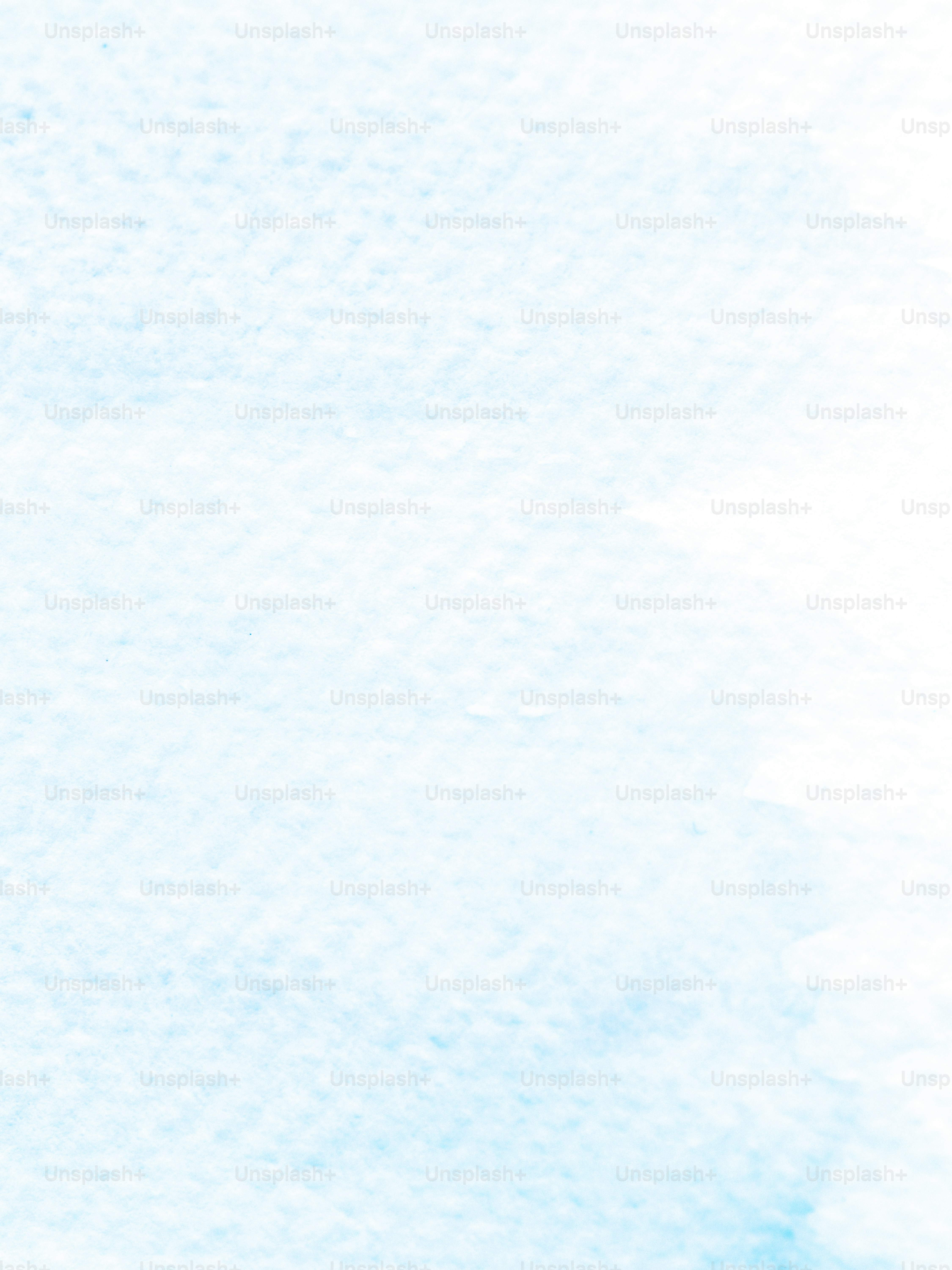 Soft blue and white watercolor wash background