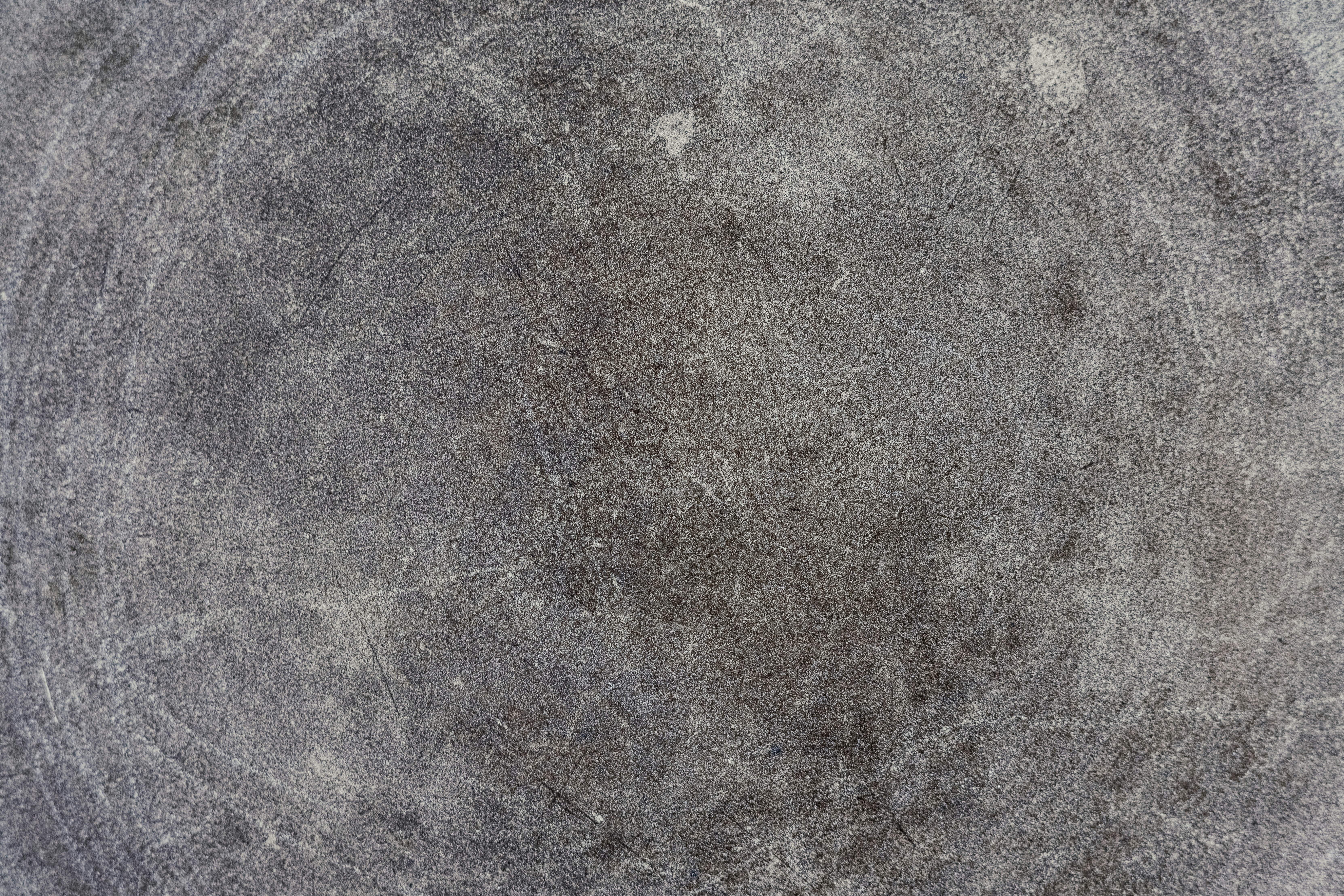 テクスチャーのある灰色の表面のクローズアップ。