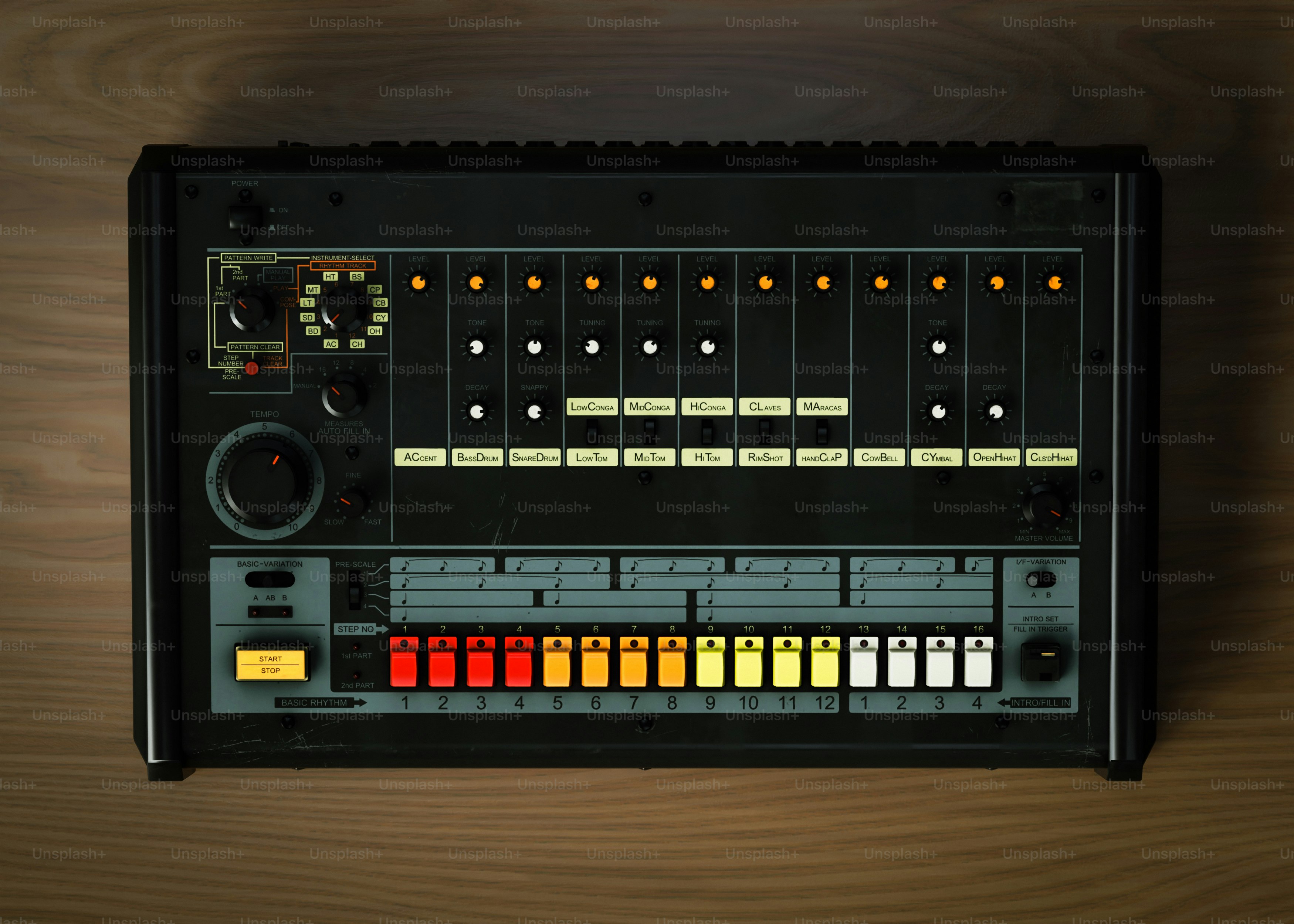 A black drum machine with colorful buttons photo – Music Image on Unsplash