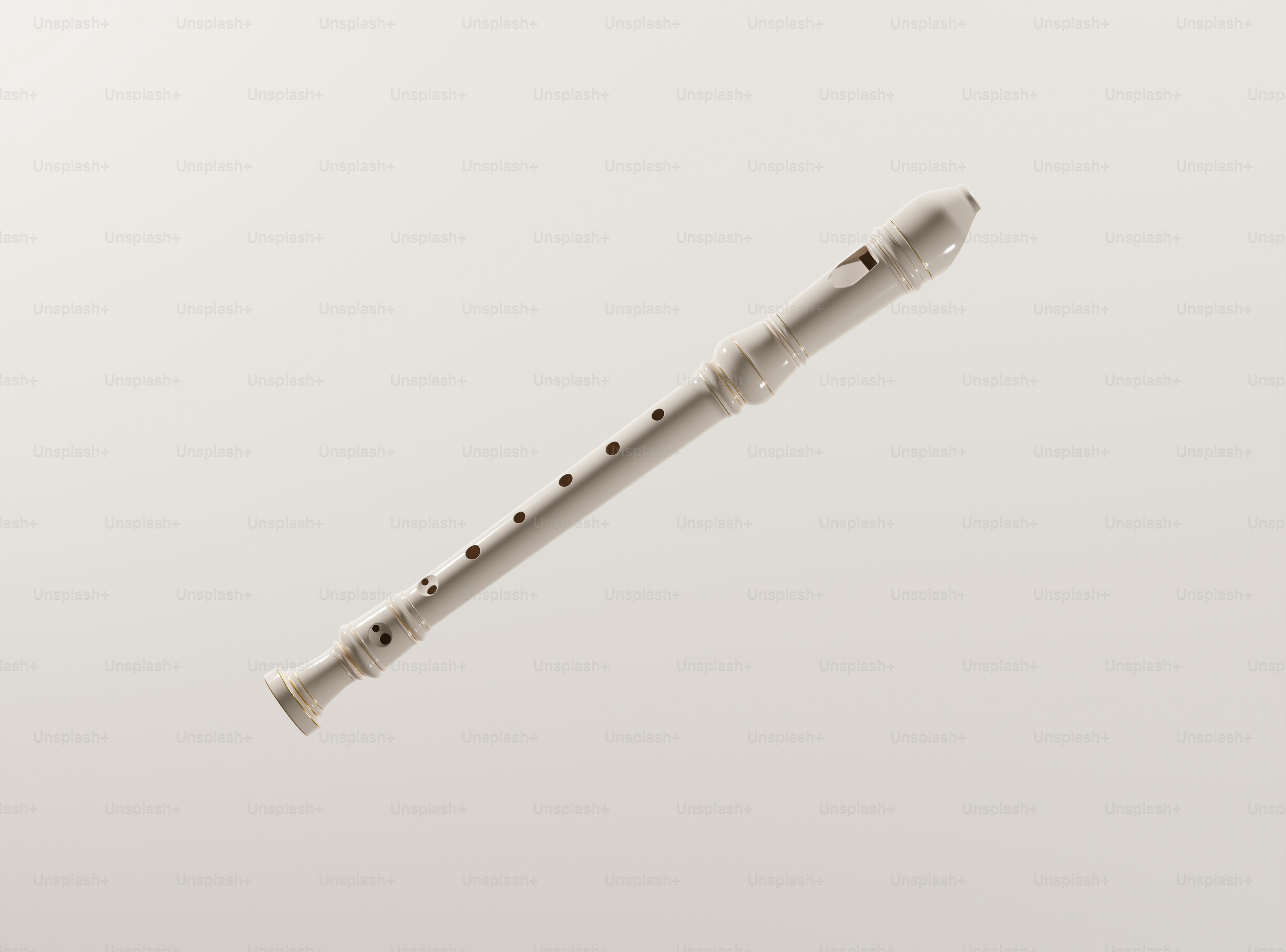 A white recorder musical instrument on a light background photo – Music ...