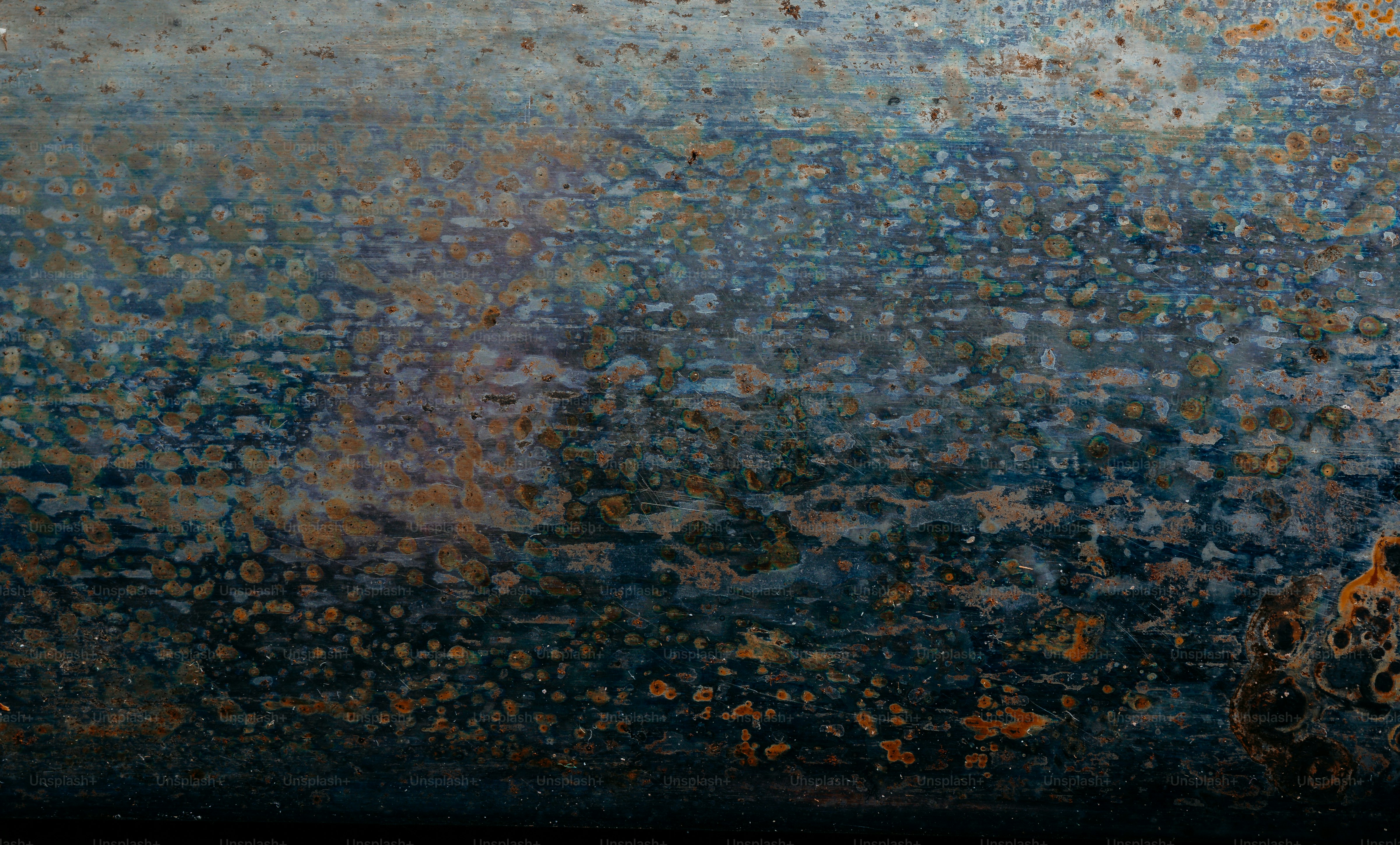 Close-up of rusted metal texture with textured patterns