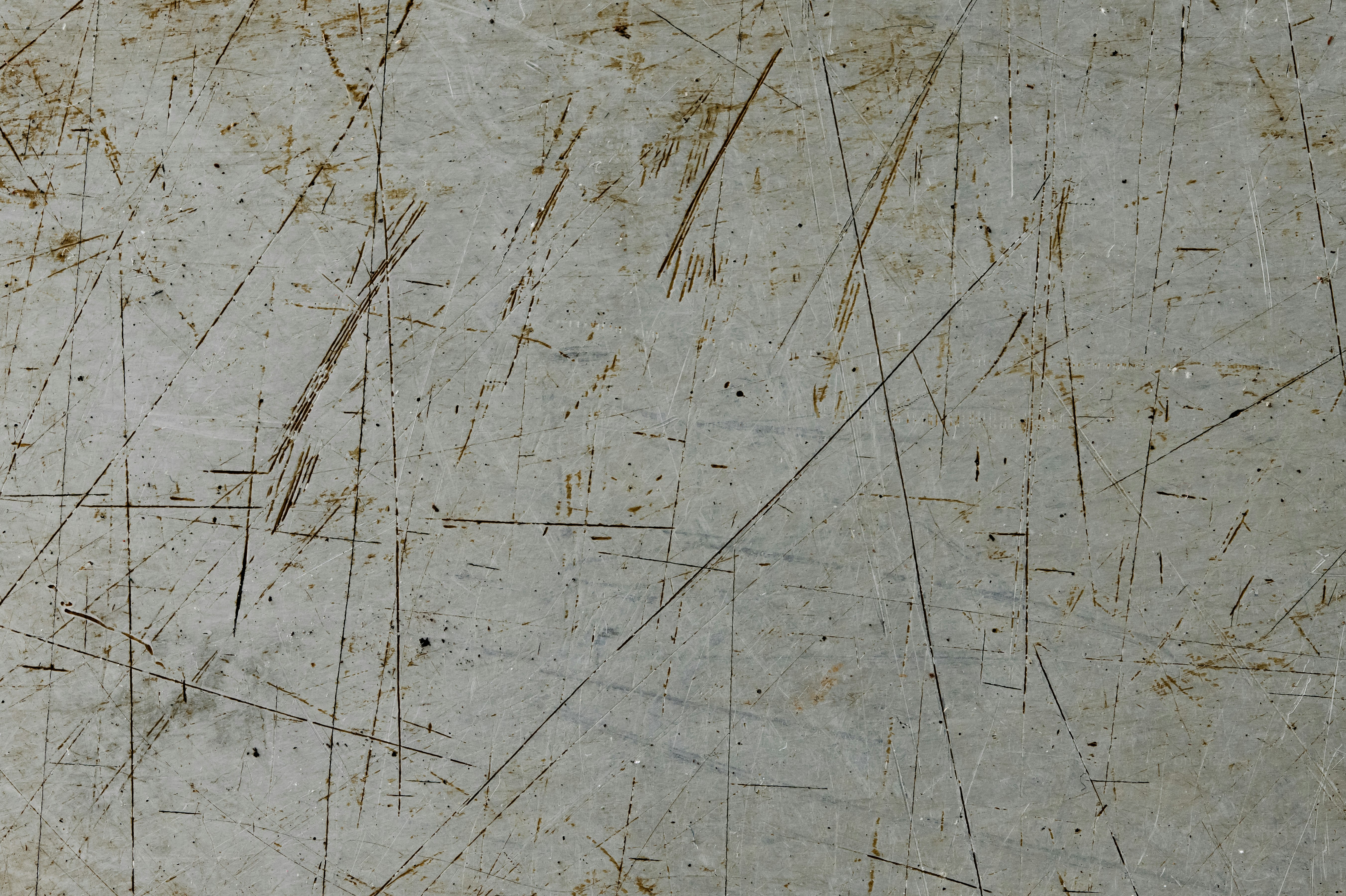 Scratched and dirty light gray surface texture