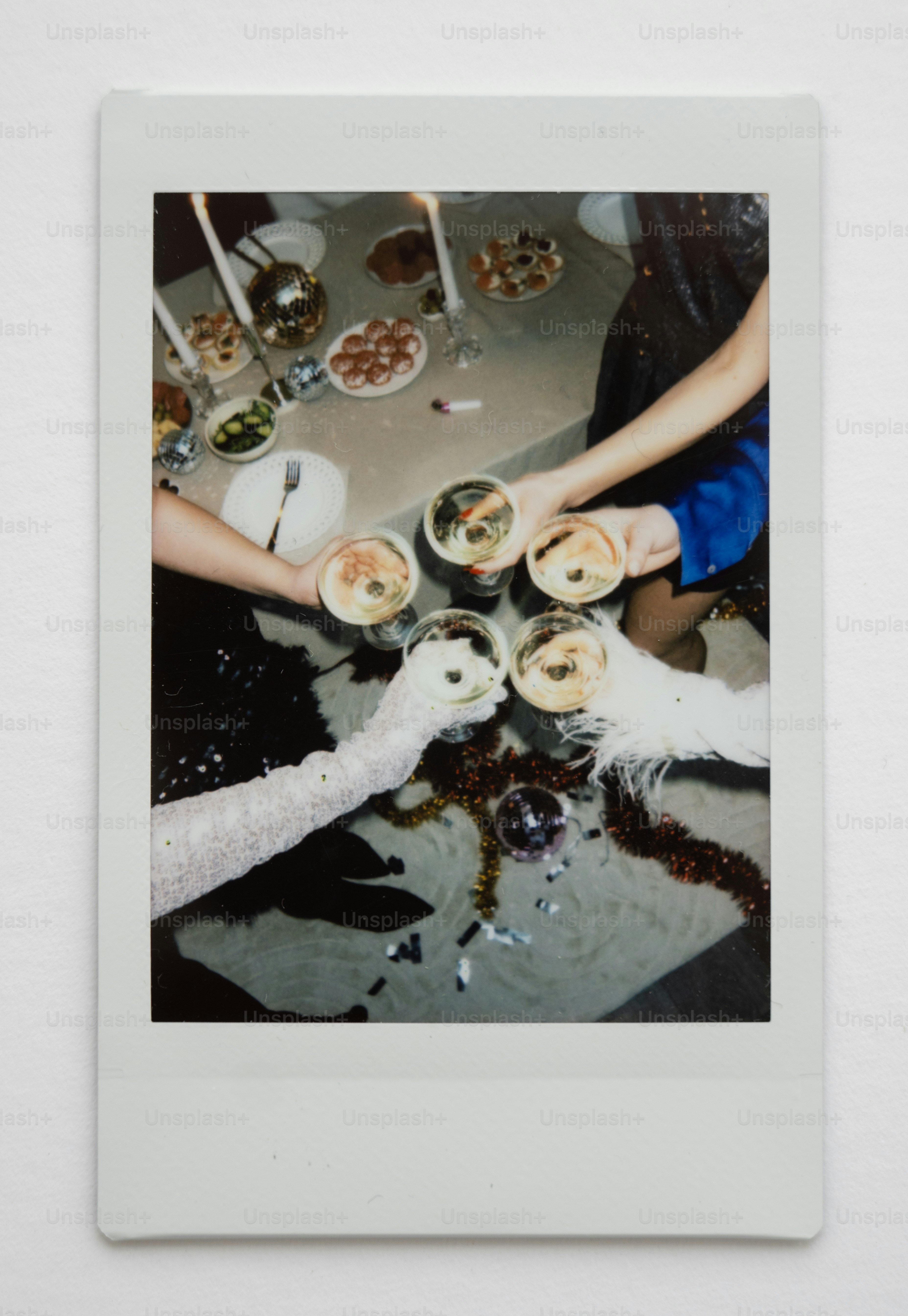 Friends toasting champagne glasses at a party