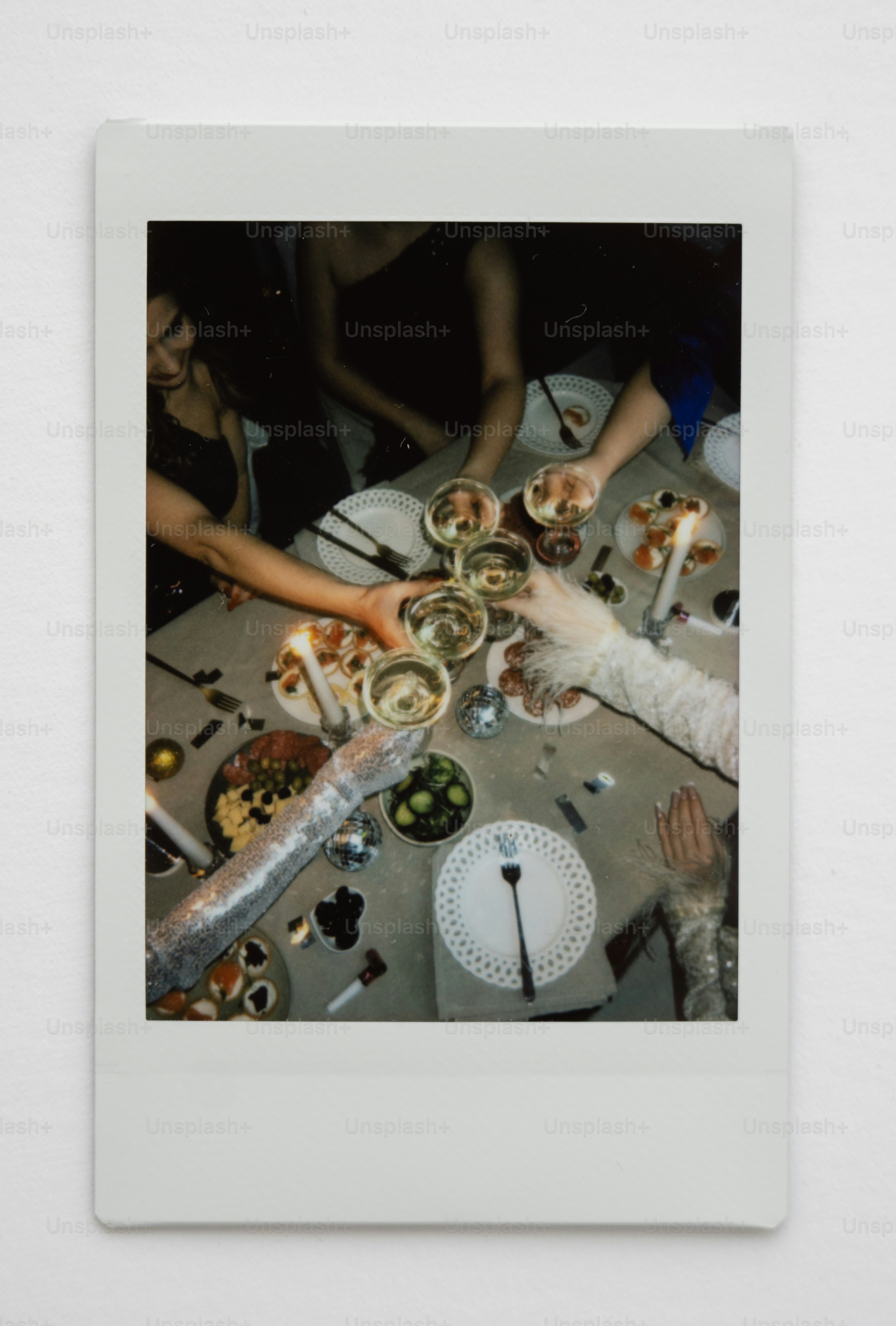 Friends toasting with champagne at a party