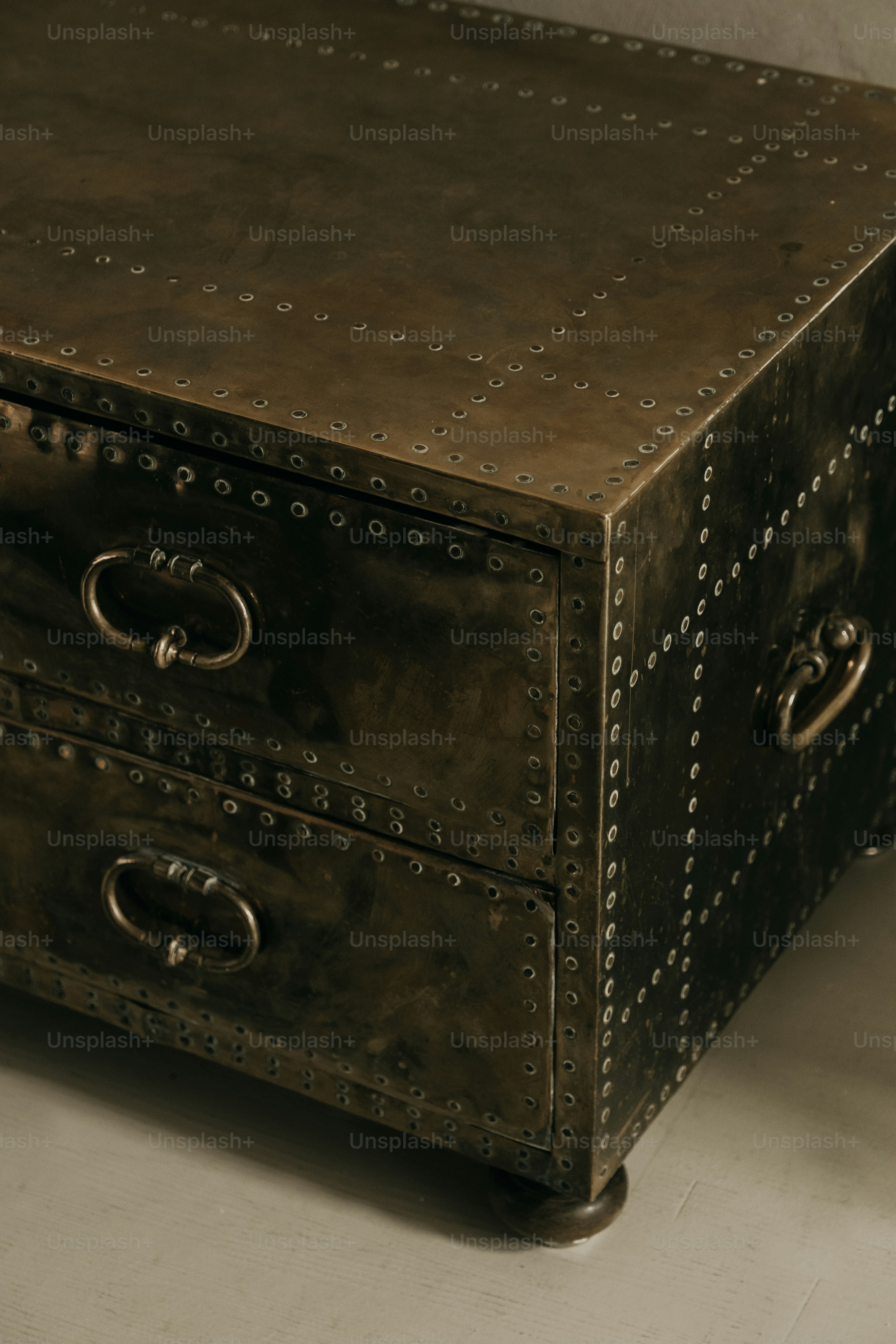 A vintage metal chest with two drawers