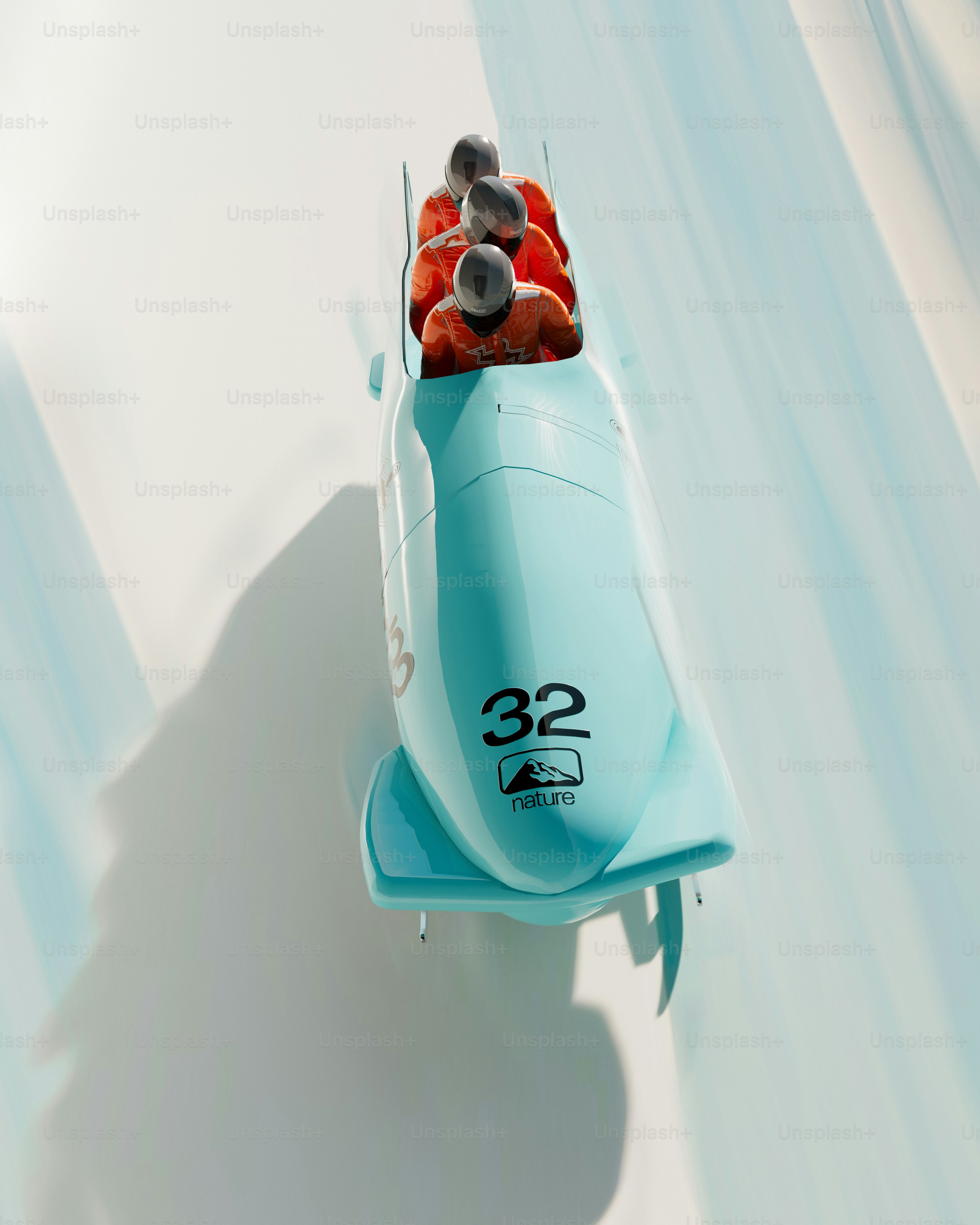 Four athletes in a bobsled racing down a track