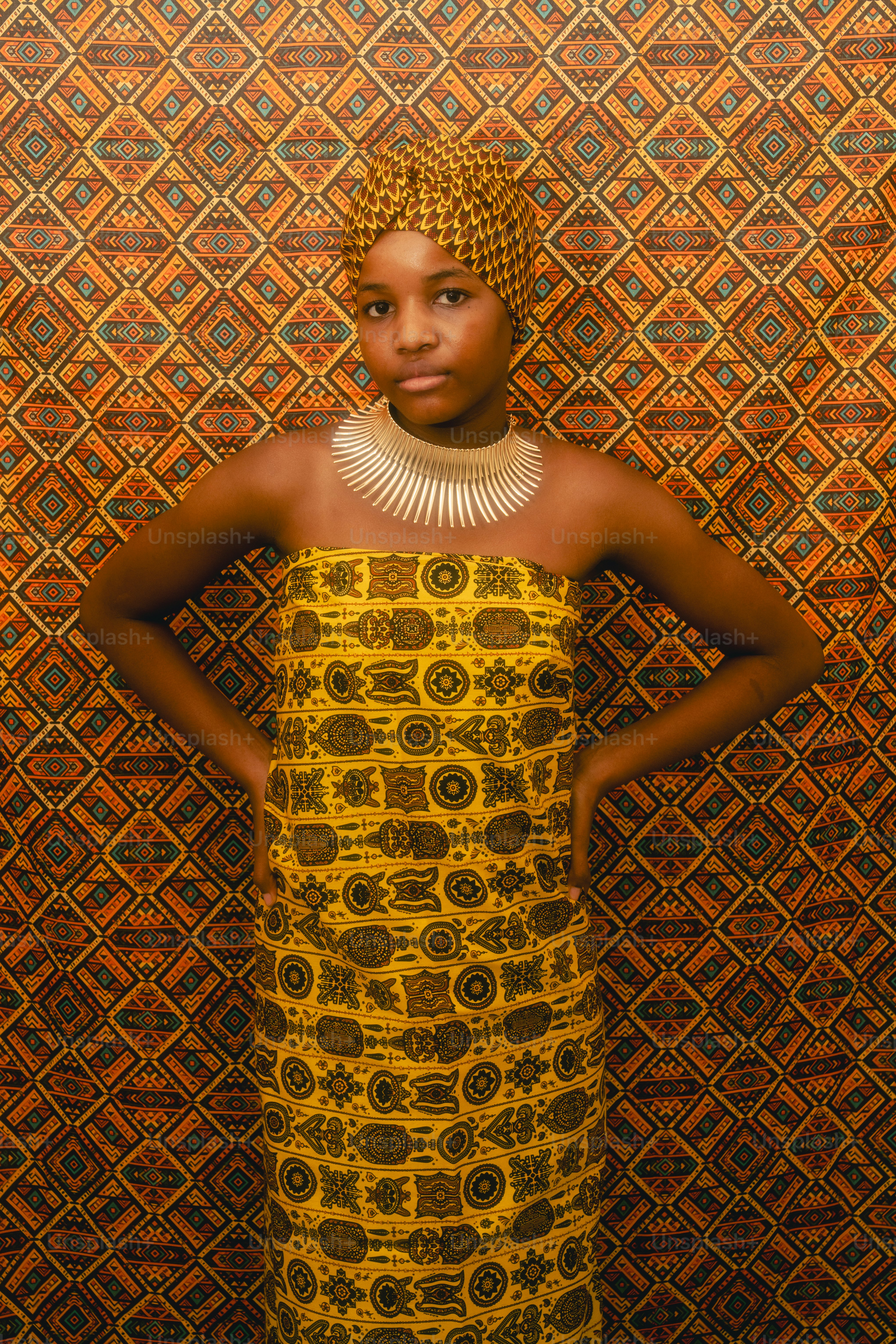 Young woman in traditional african attire and jewelry.
