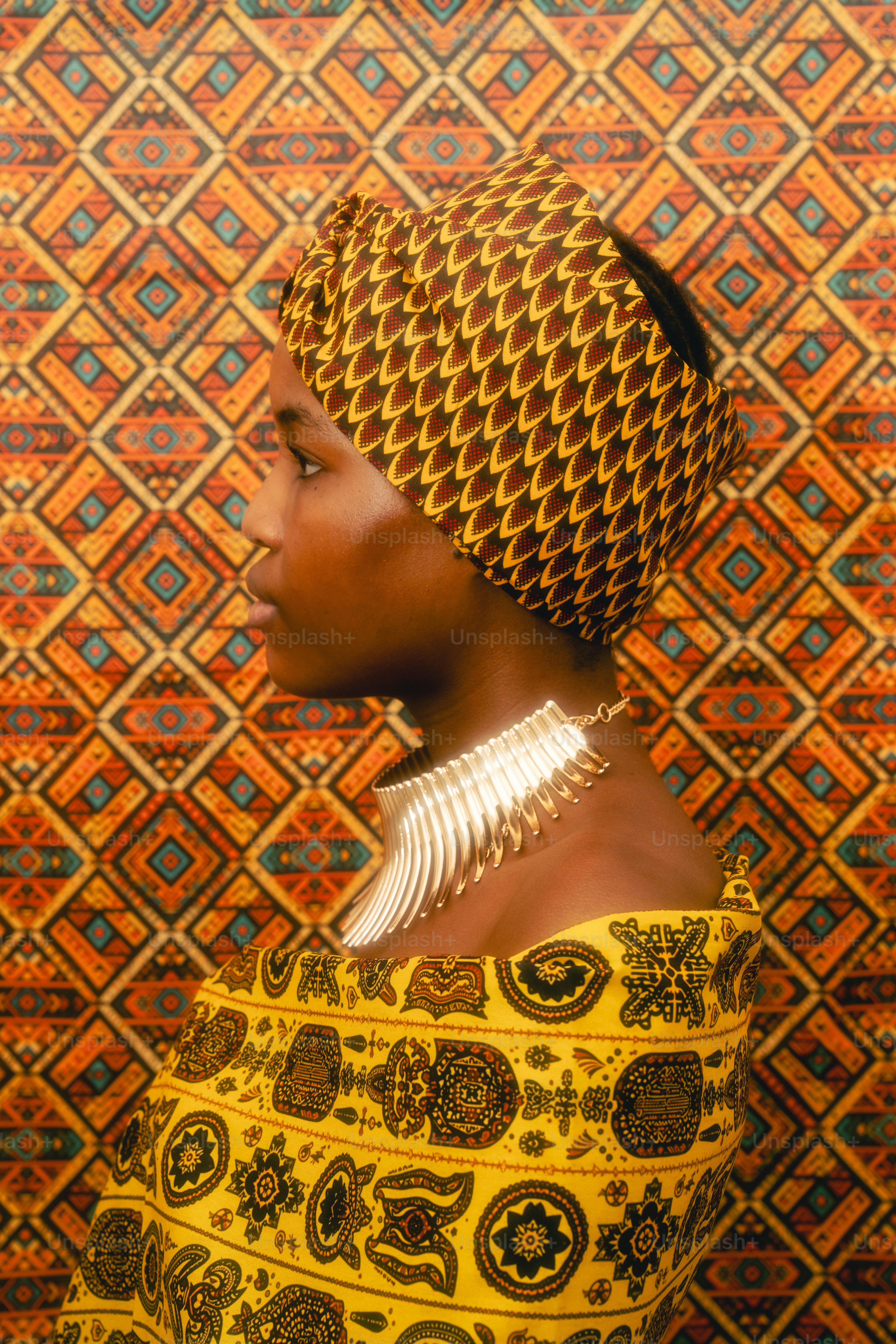 Woman in traditional african attire and jewelry photo – Patterns Image ...