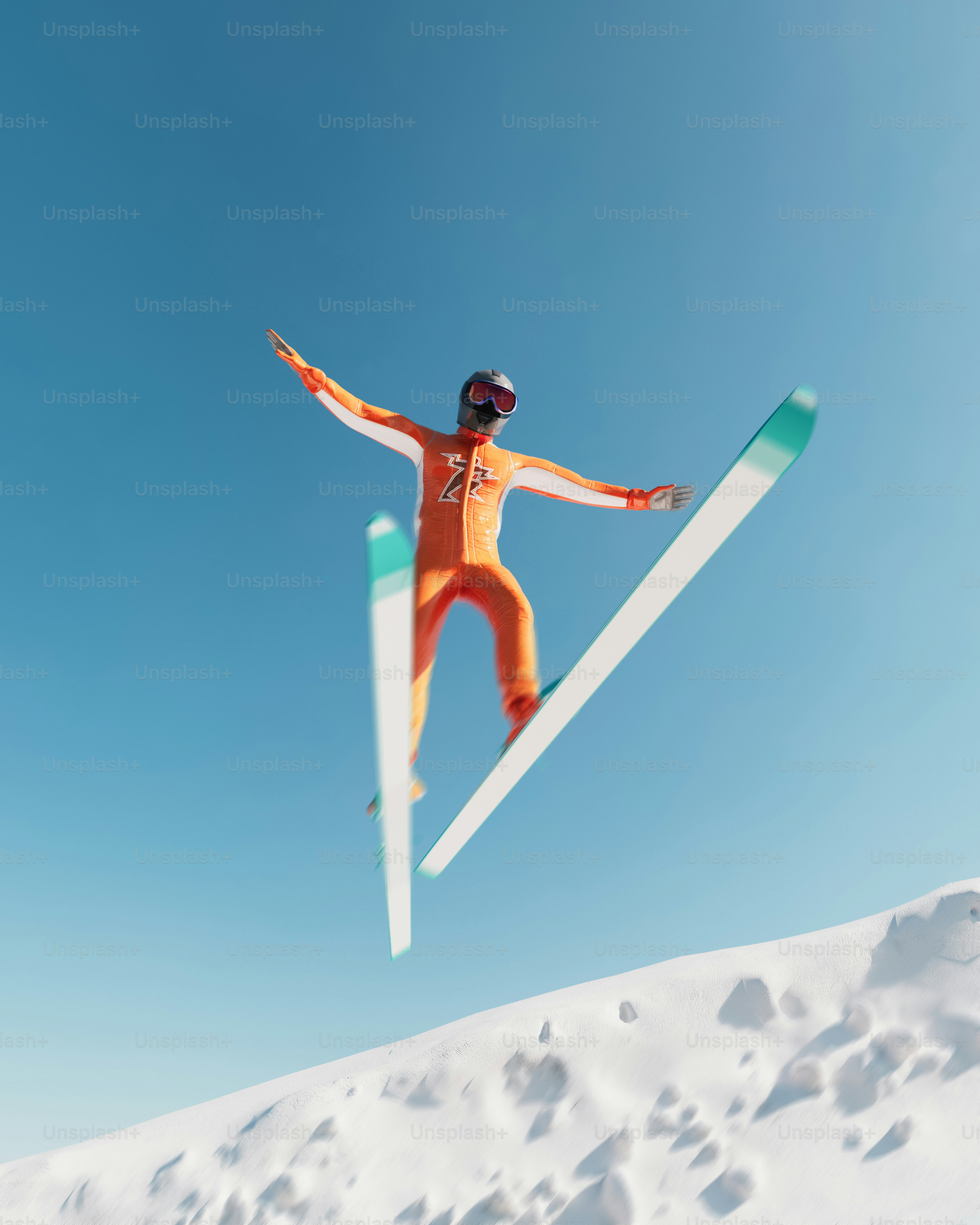 A ski jumper in mid-air against a clear blue sky.