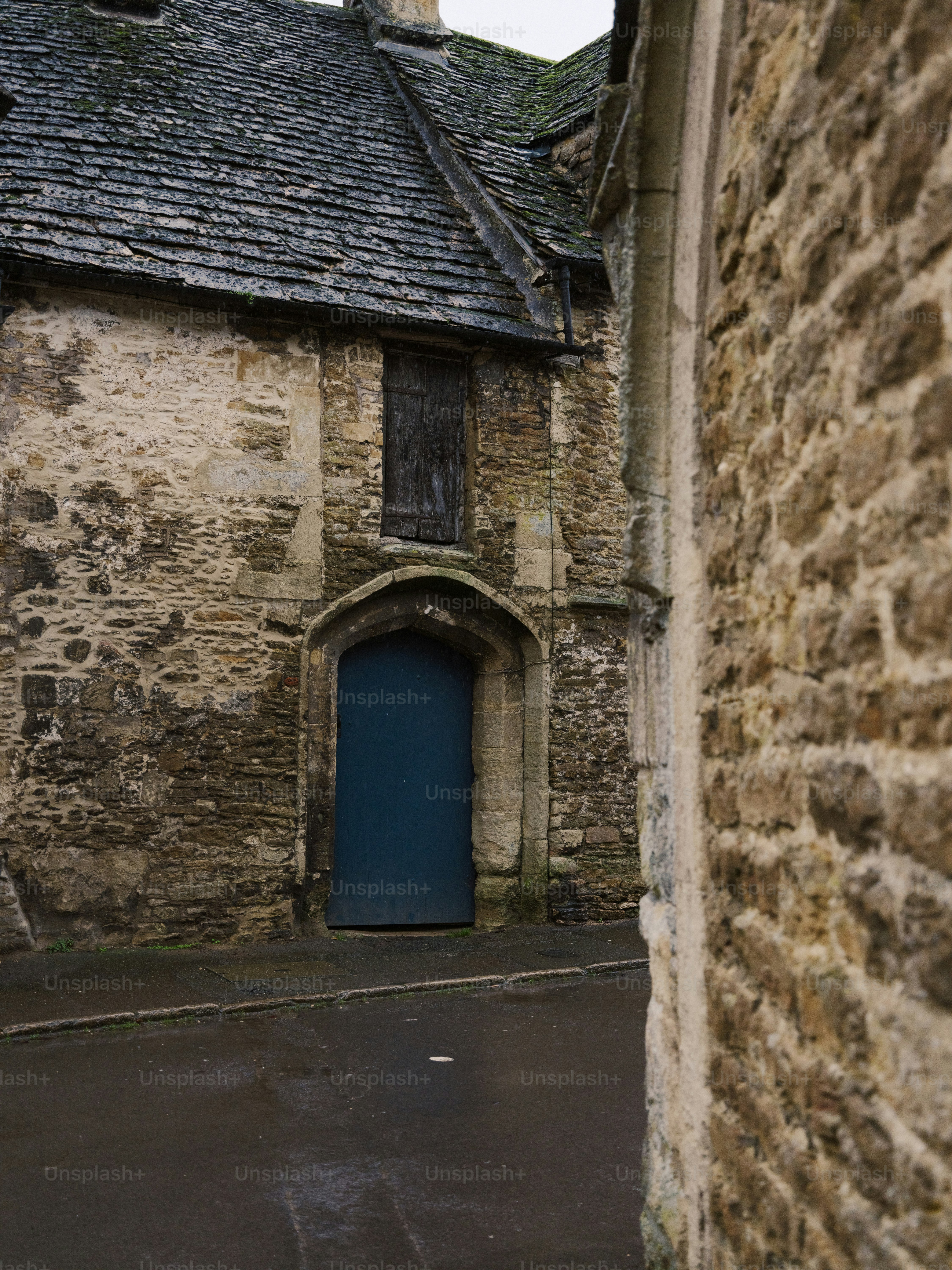 Old stone building with a blue door