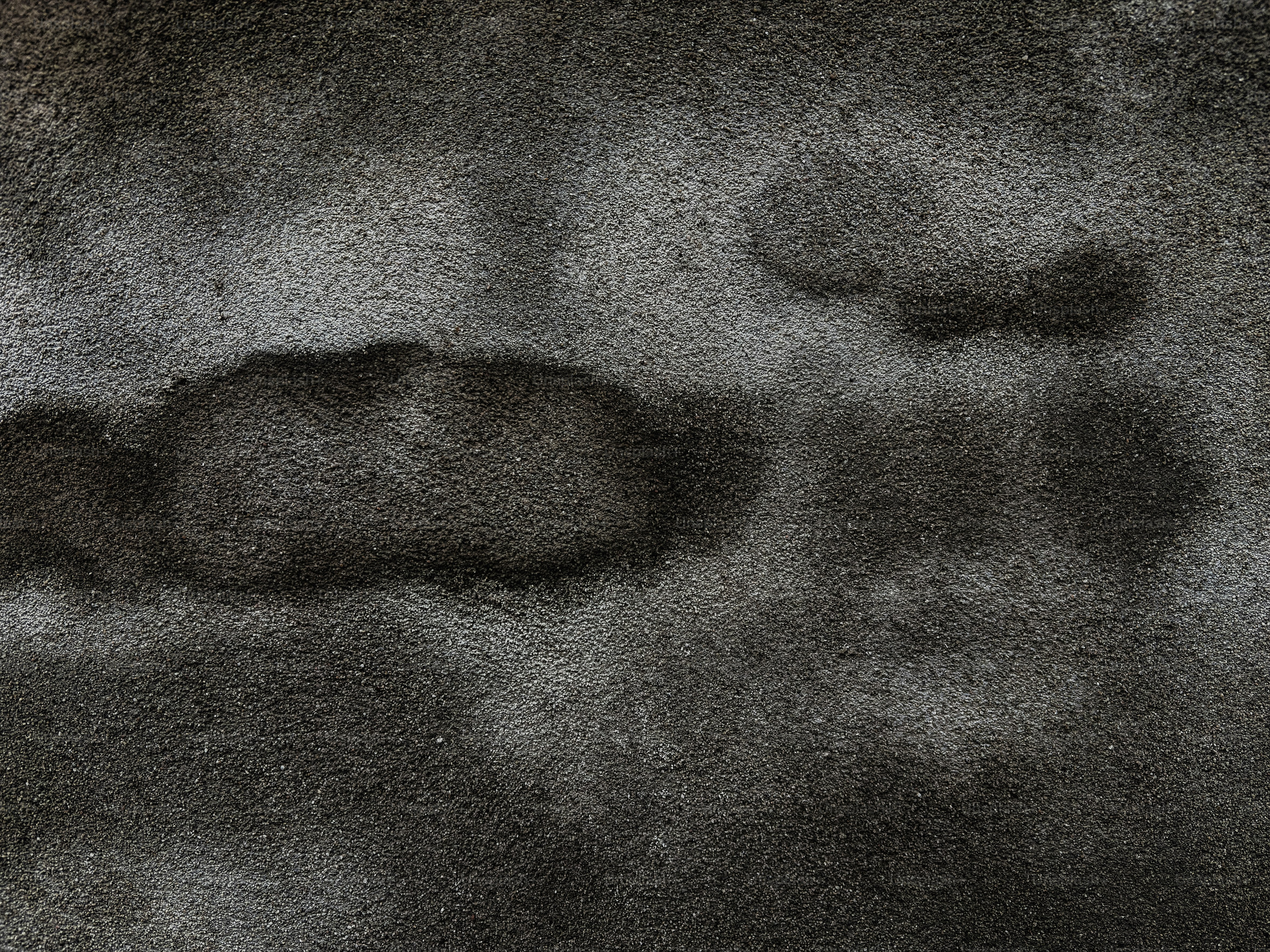 Abstract texture of dark and light gray splotches