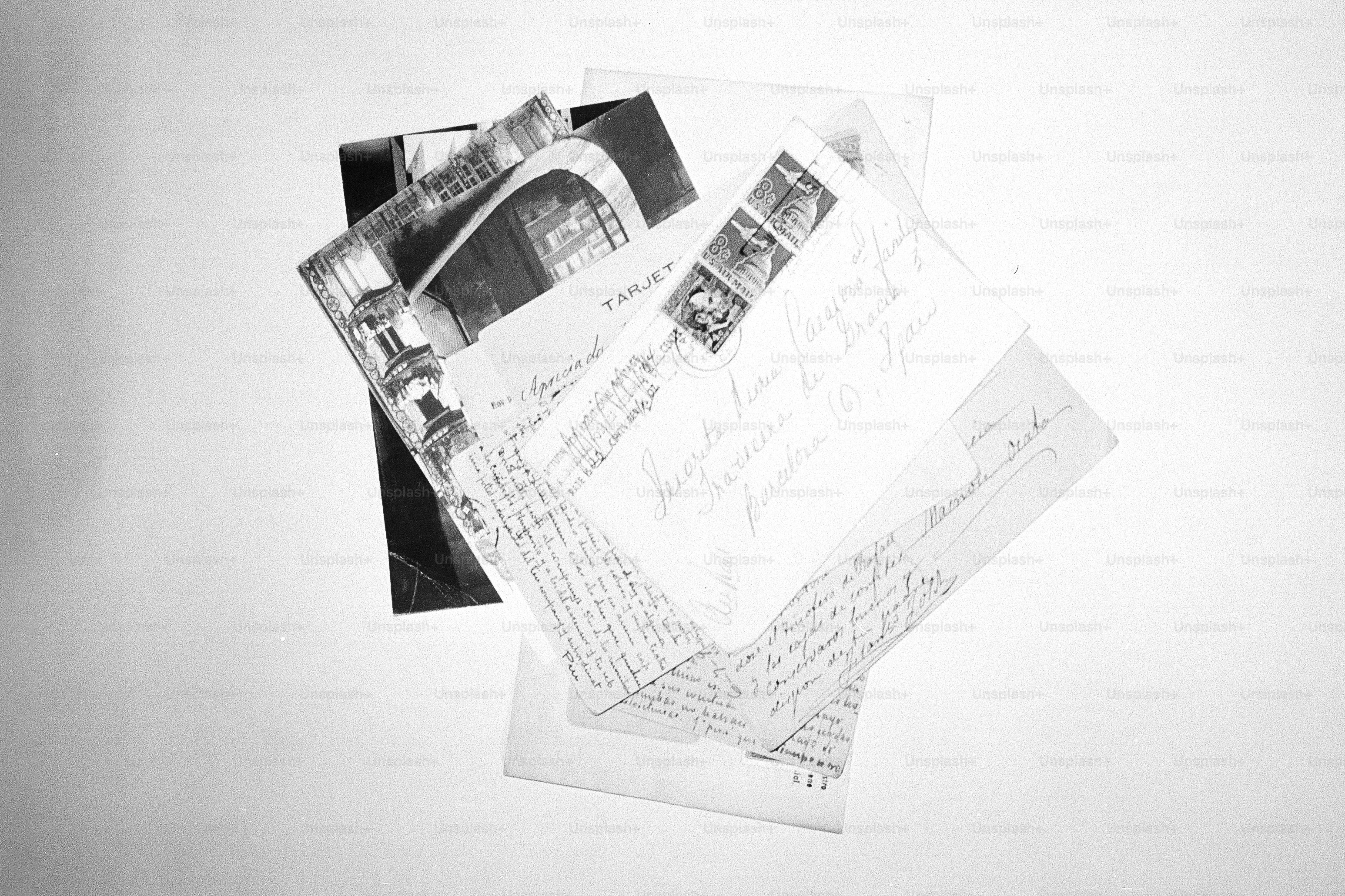 Several old letters and photographs are scattered.