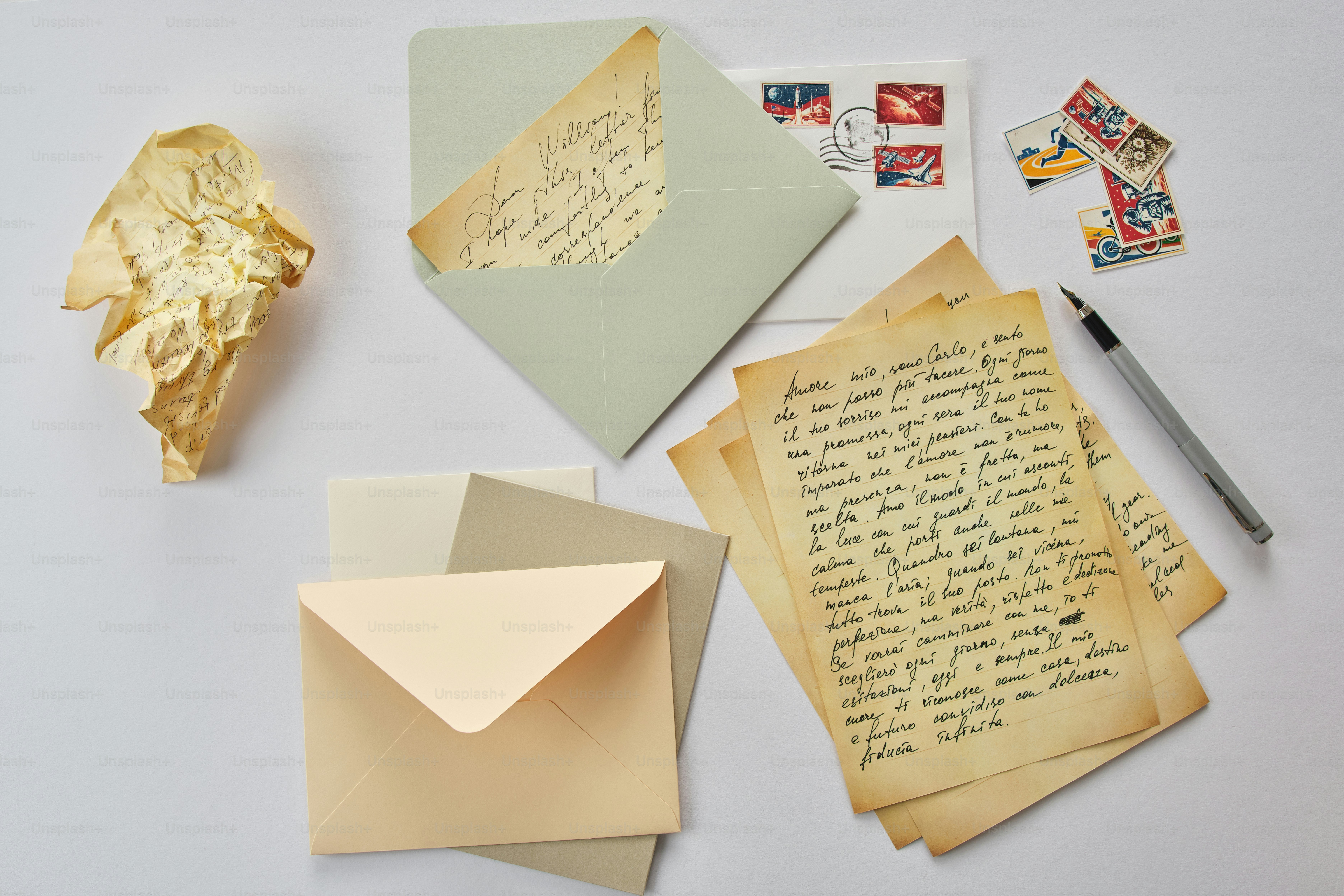 Letters and envelopes with a pen and golden ornament. photo – Paper ...