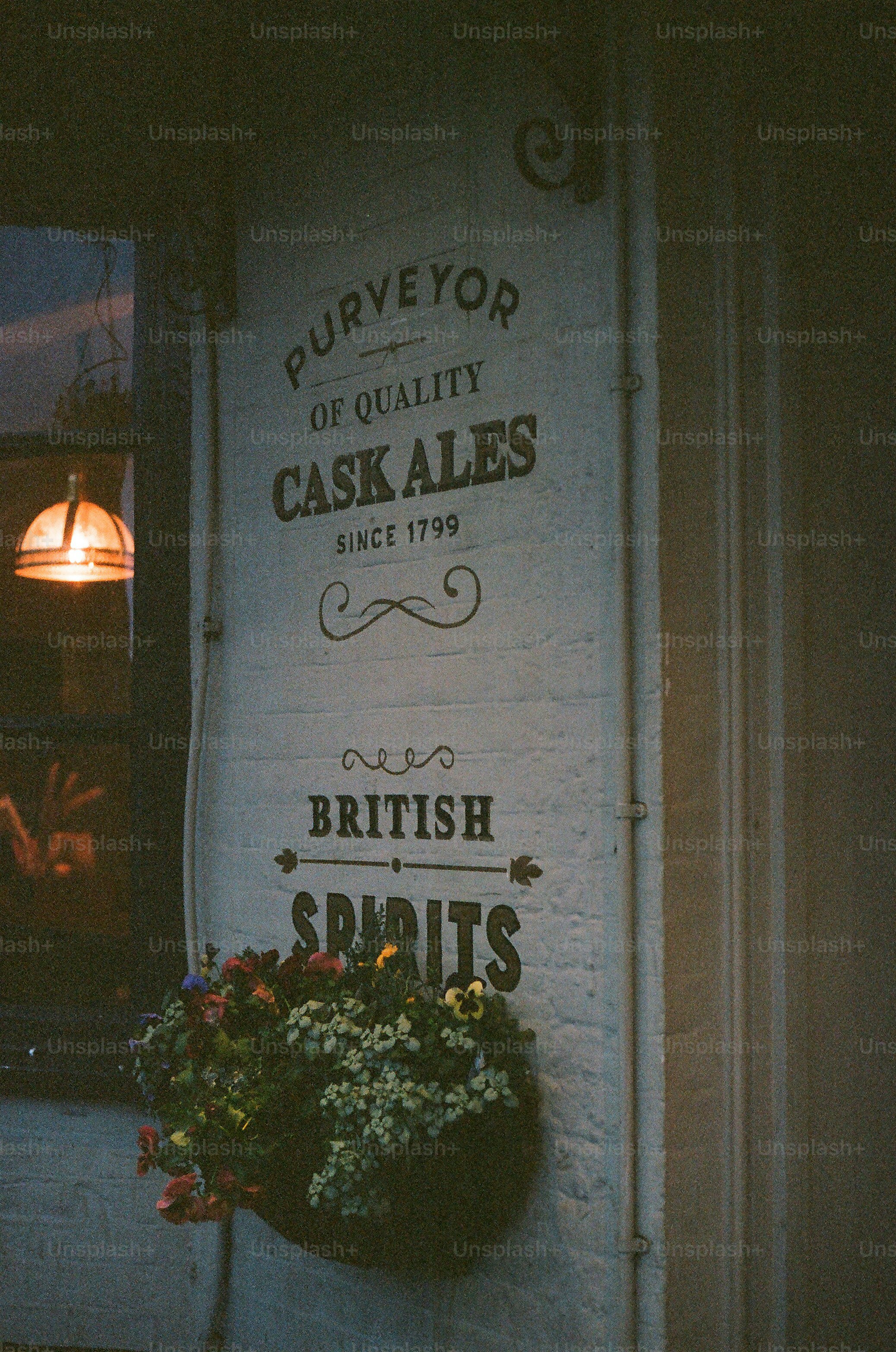 Pub sign advertising cask ales and british spirits