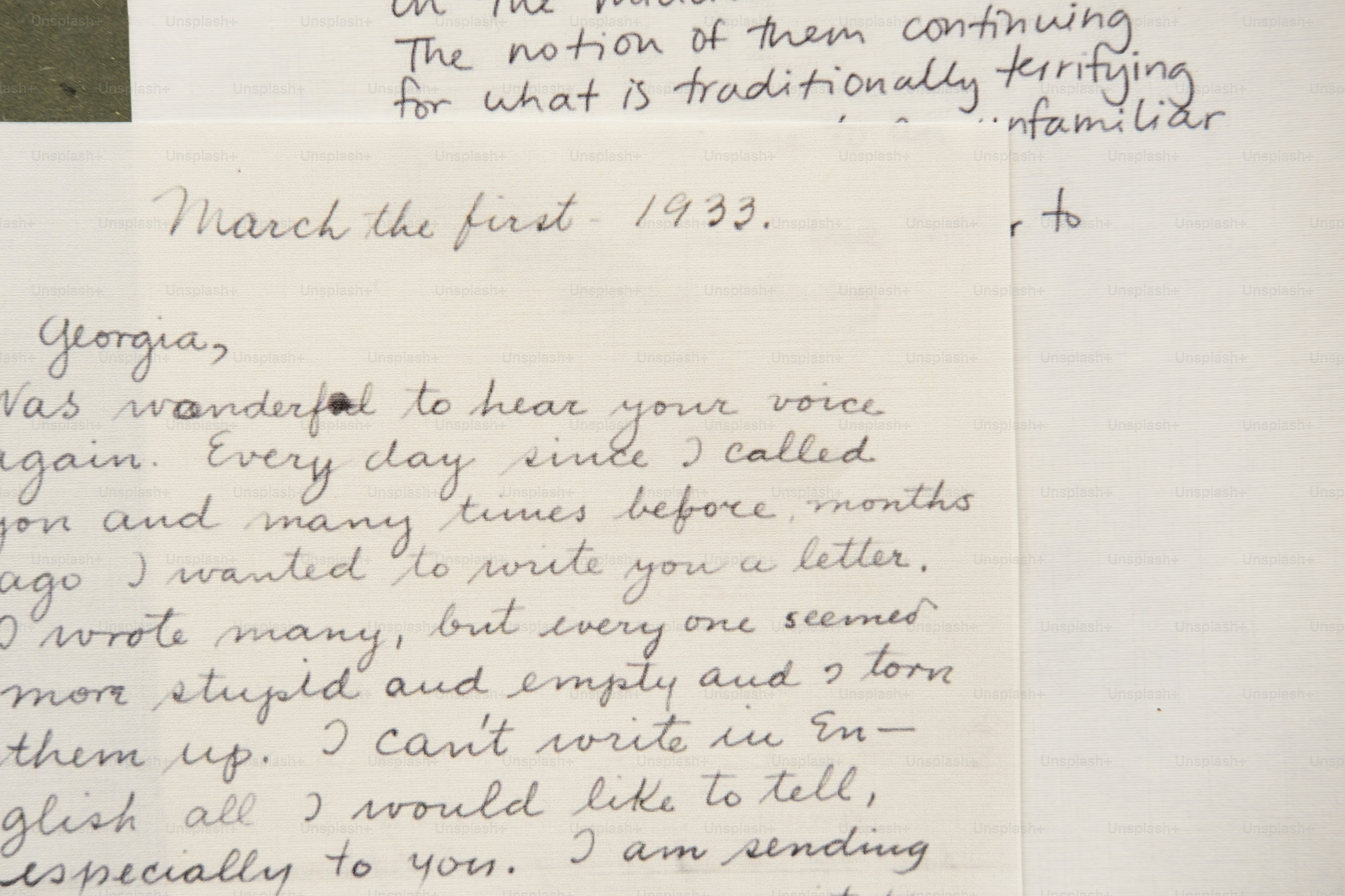 Hands holding a handwritten letter with a signature. photo – Paper ...