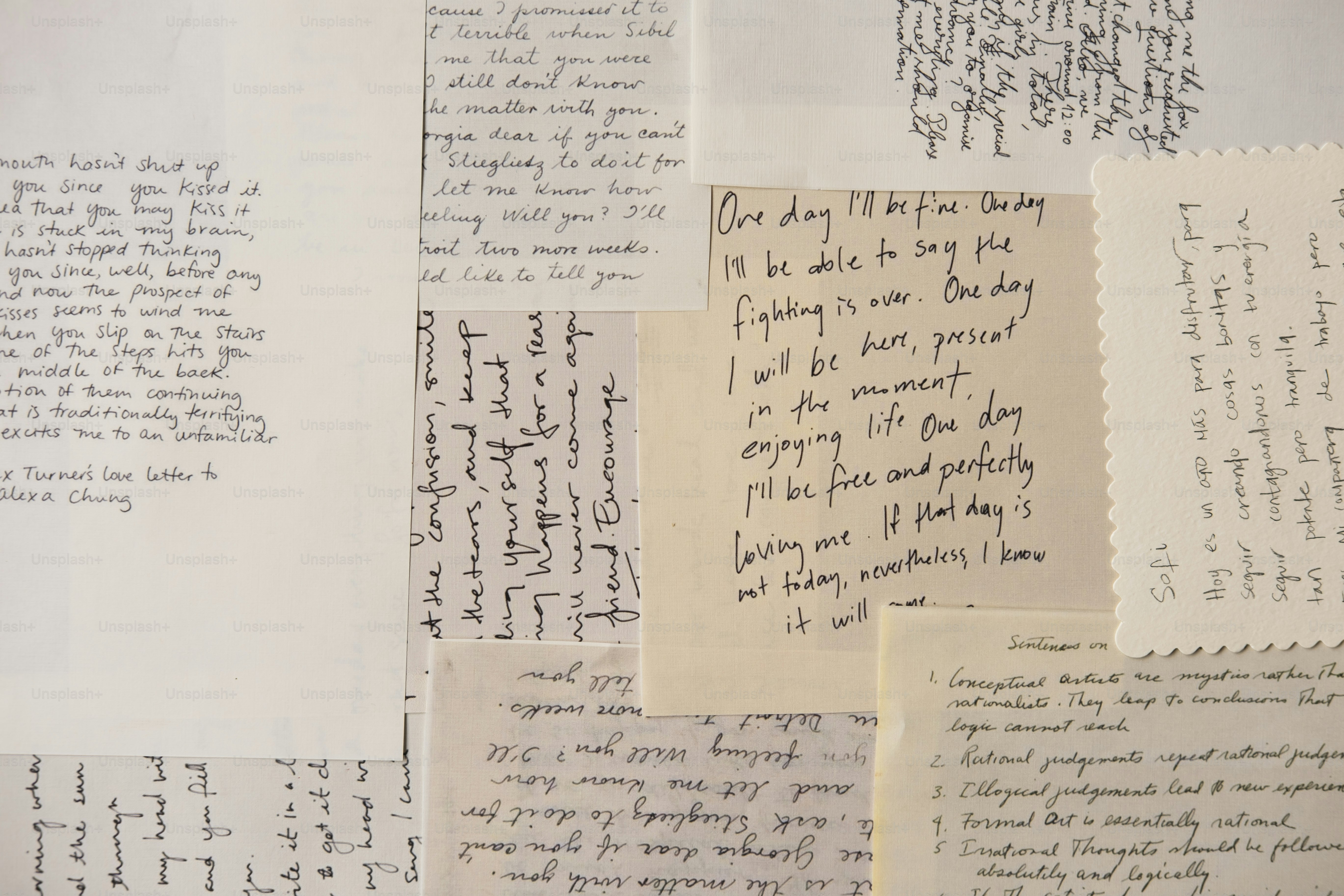 Scattered handwritten notes and letters on paper