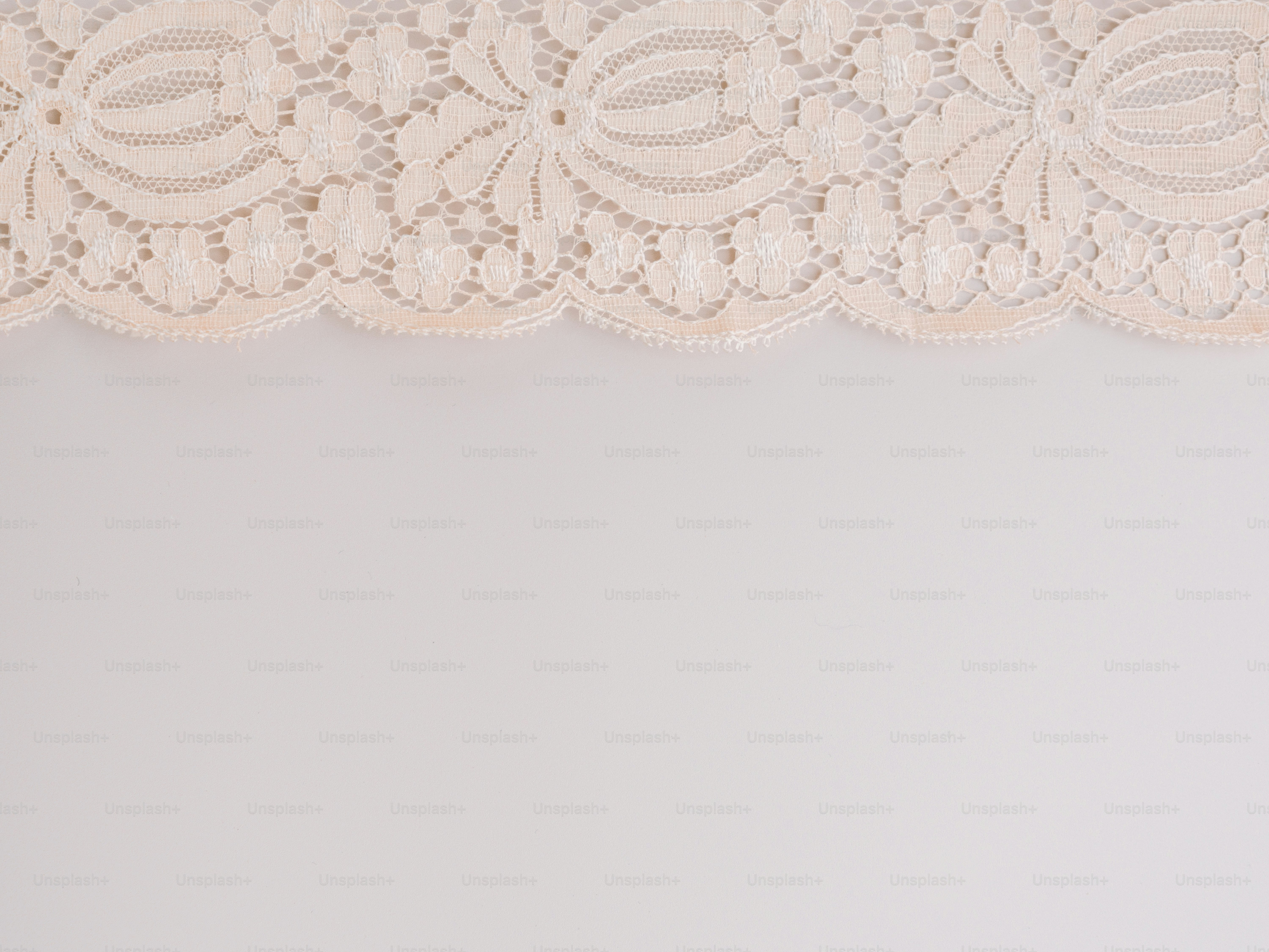 Delicate cream lace trim with floral pattern