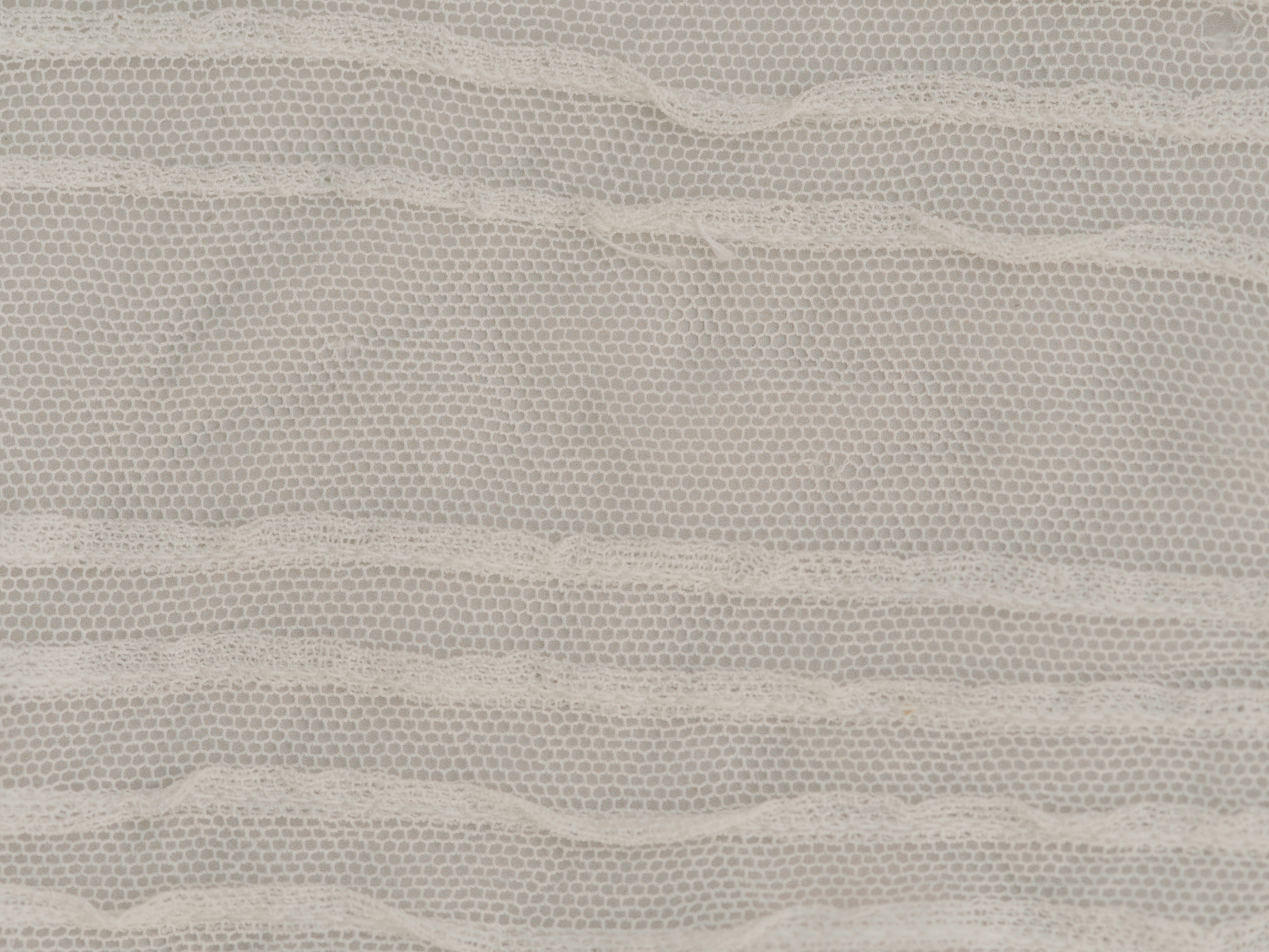 Sheer fabric with horizontal textured stripes