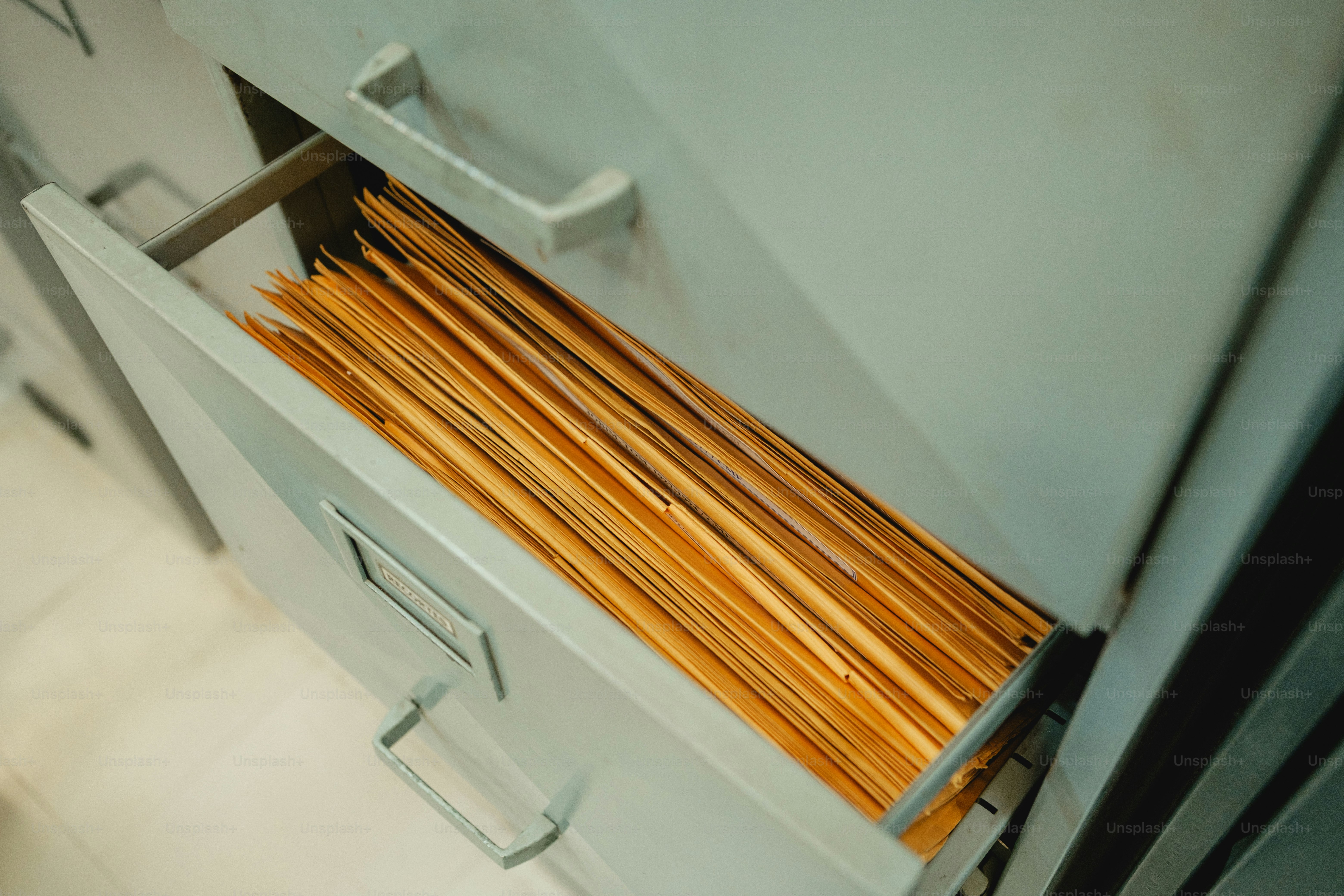 Filing cabinet drawer filled with manila folders
