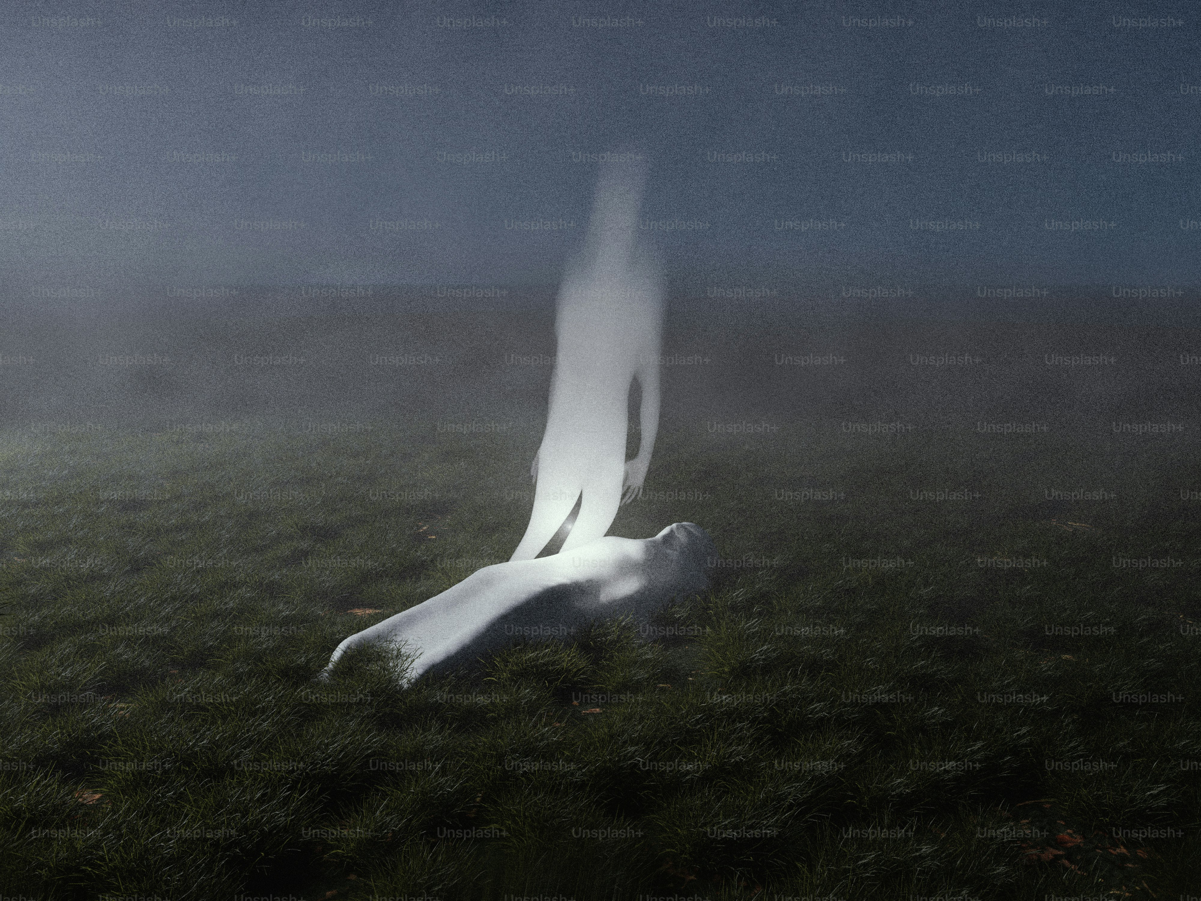 Ghostly figure emerging from a person lying on grass