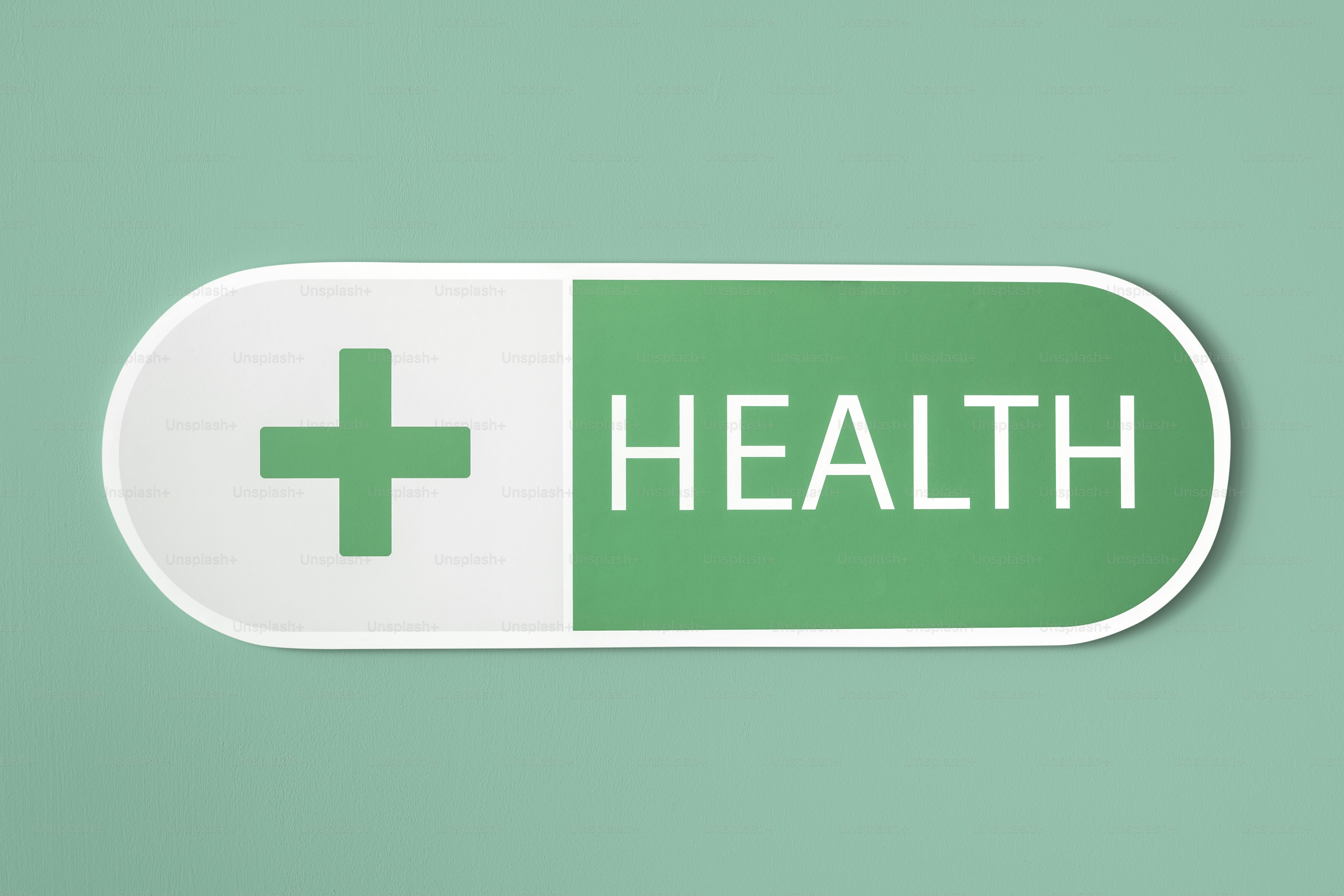 A pill-shaped icon with a green plus sign and the word HEALTH