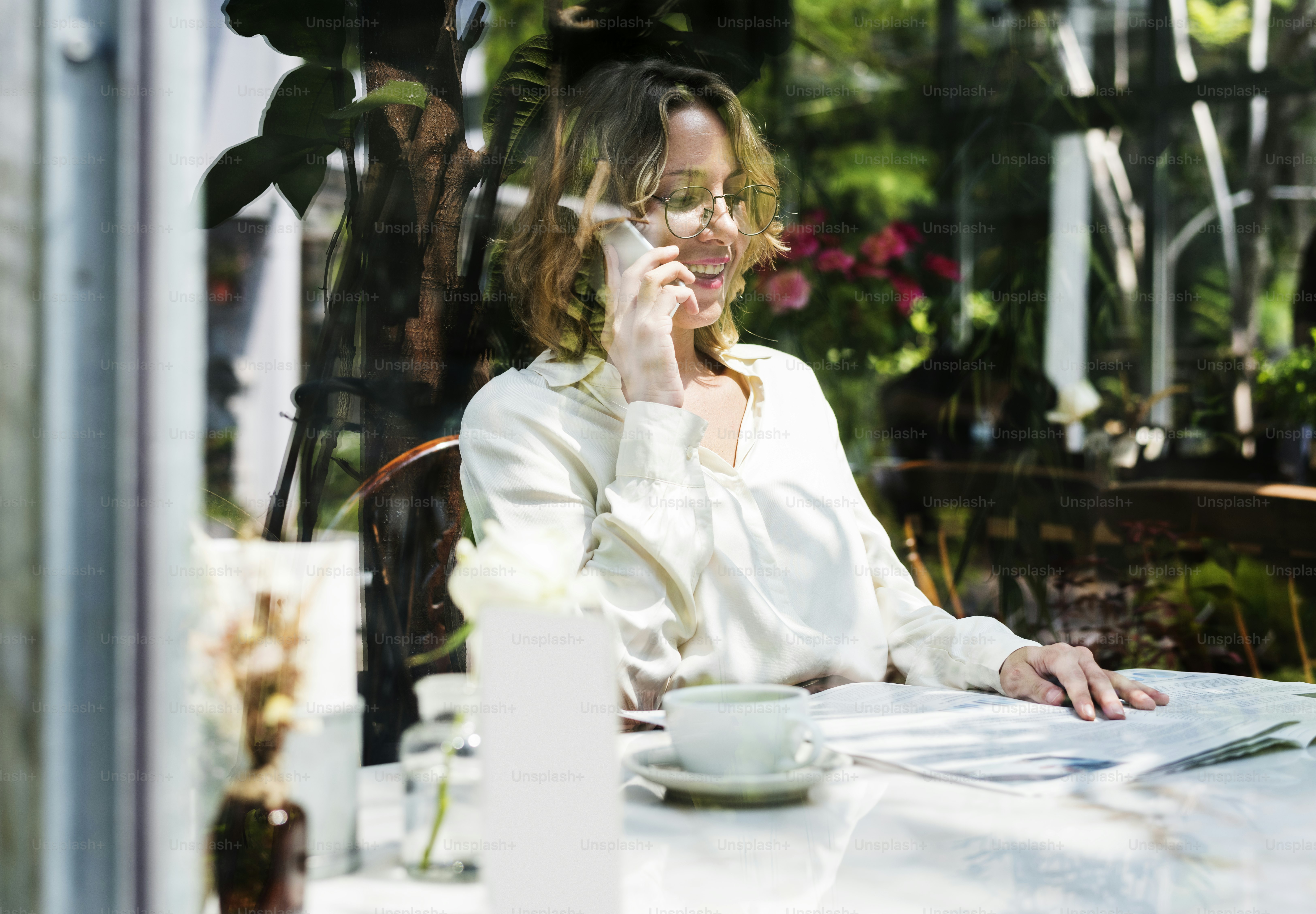 Business people reading newspaper