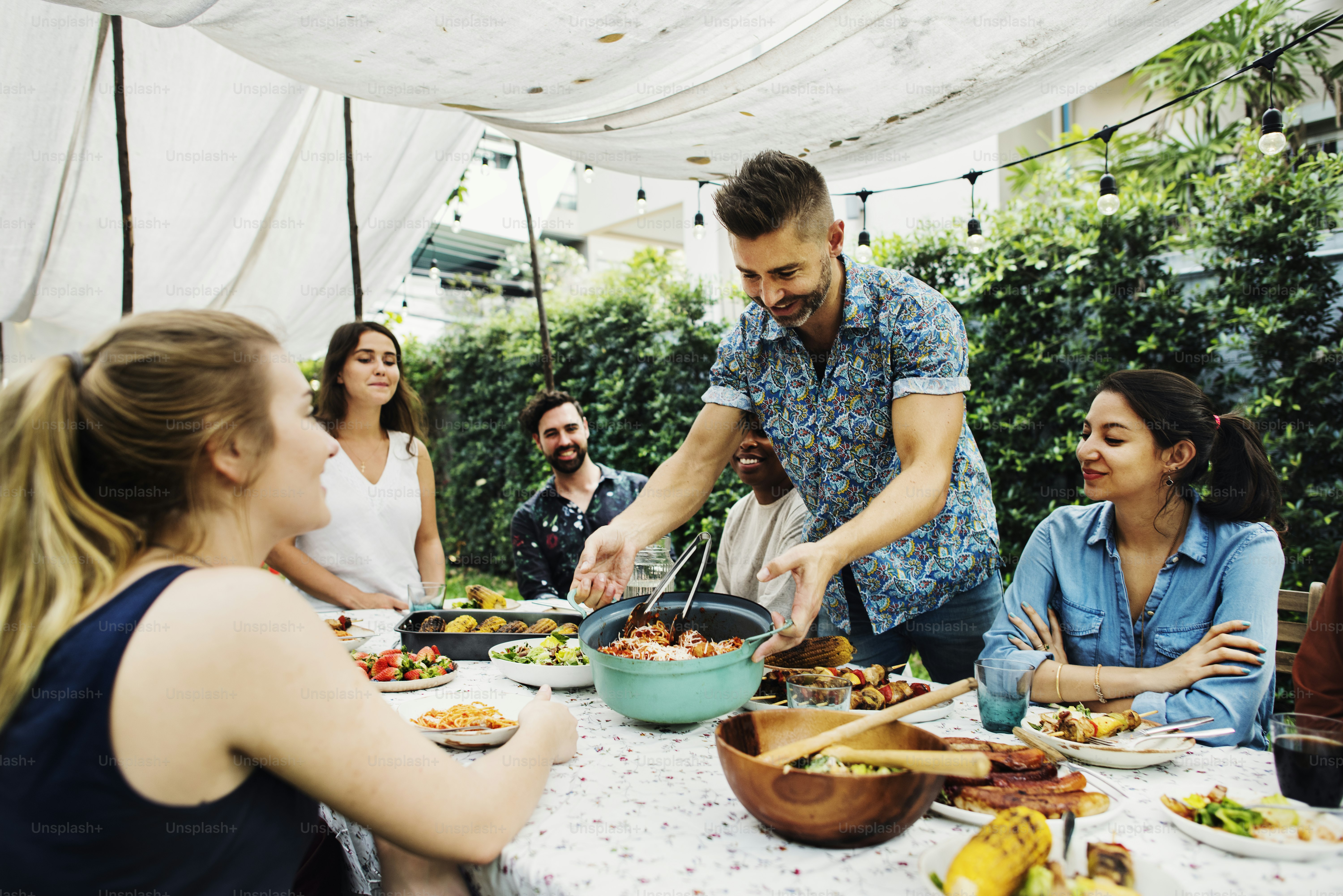 Group of diverse friends enjoying summer party together