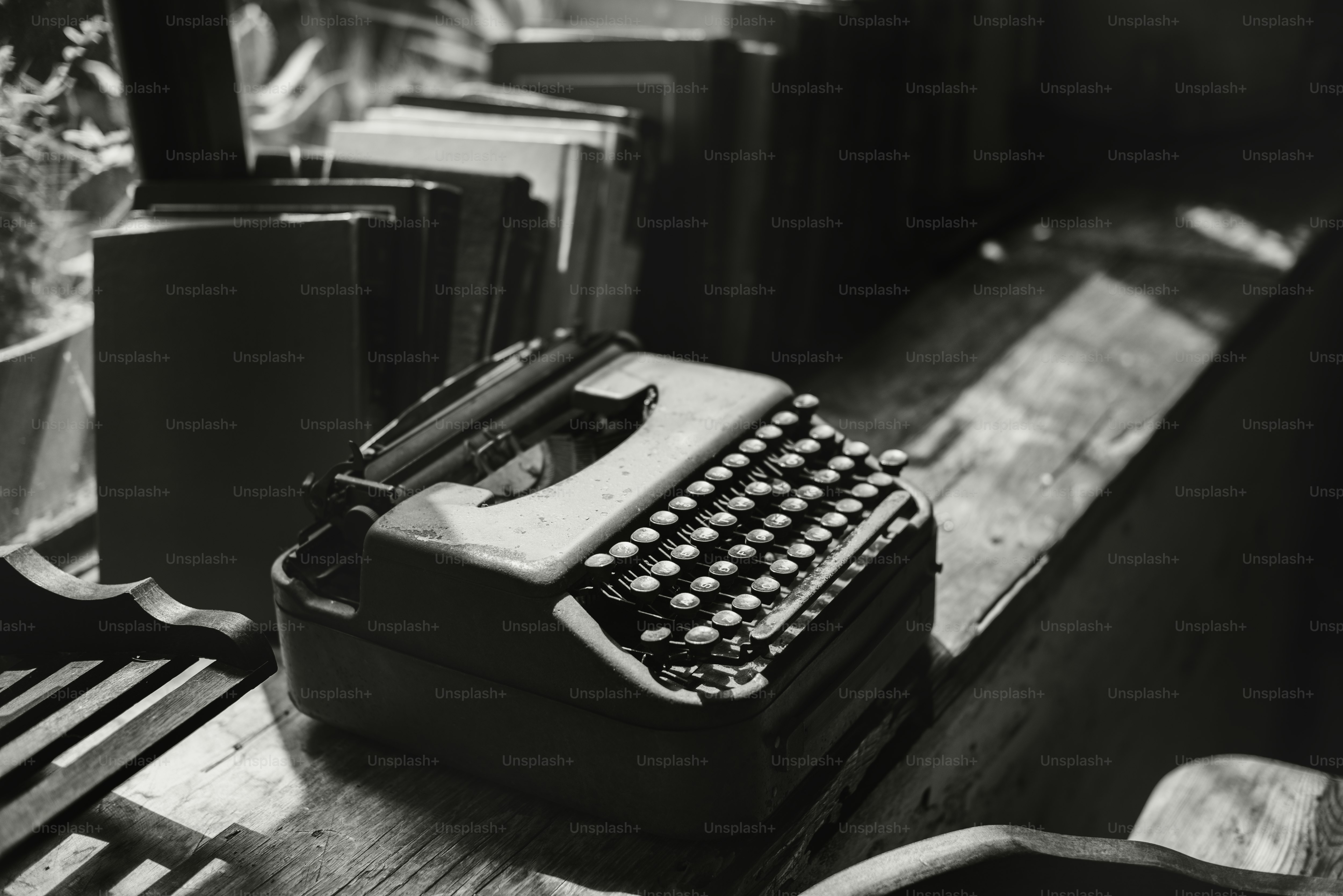 Closeup of retro typewriter on wooden table