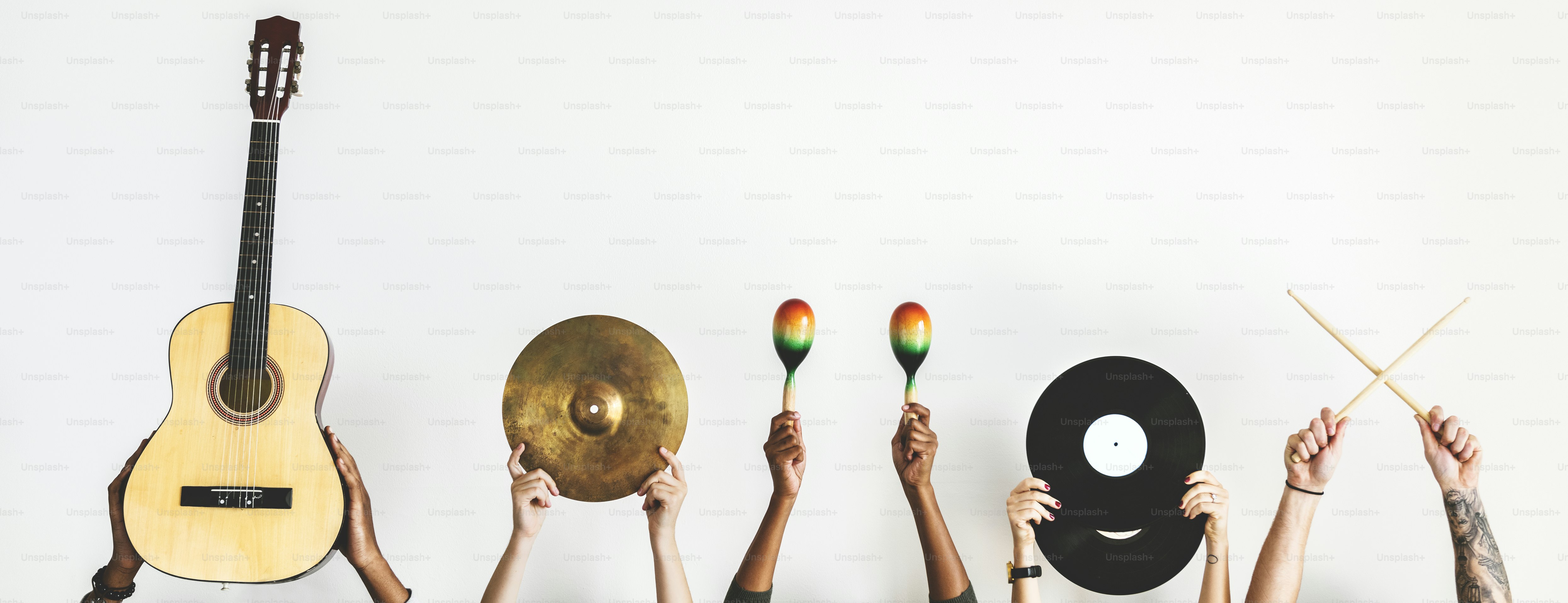 Hands holding music instruments photo – Music Image on Unsplash