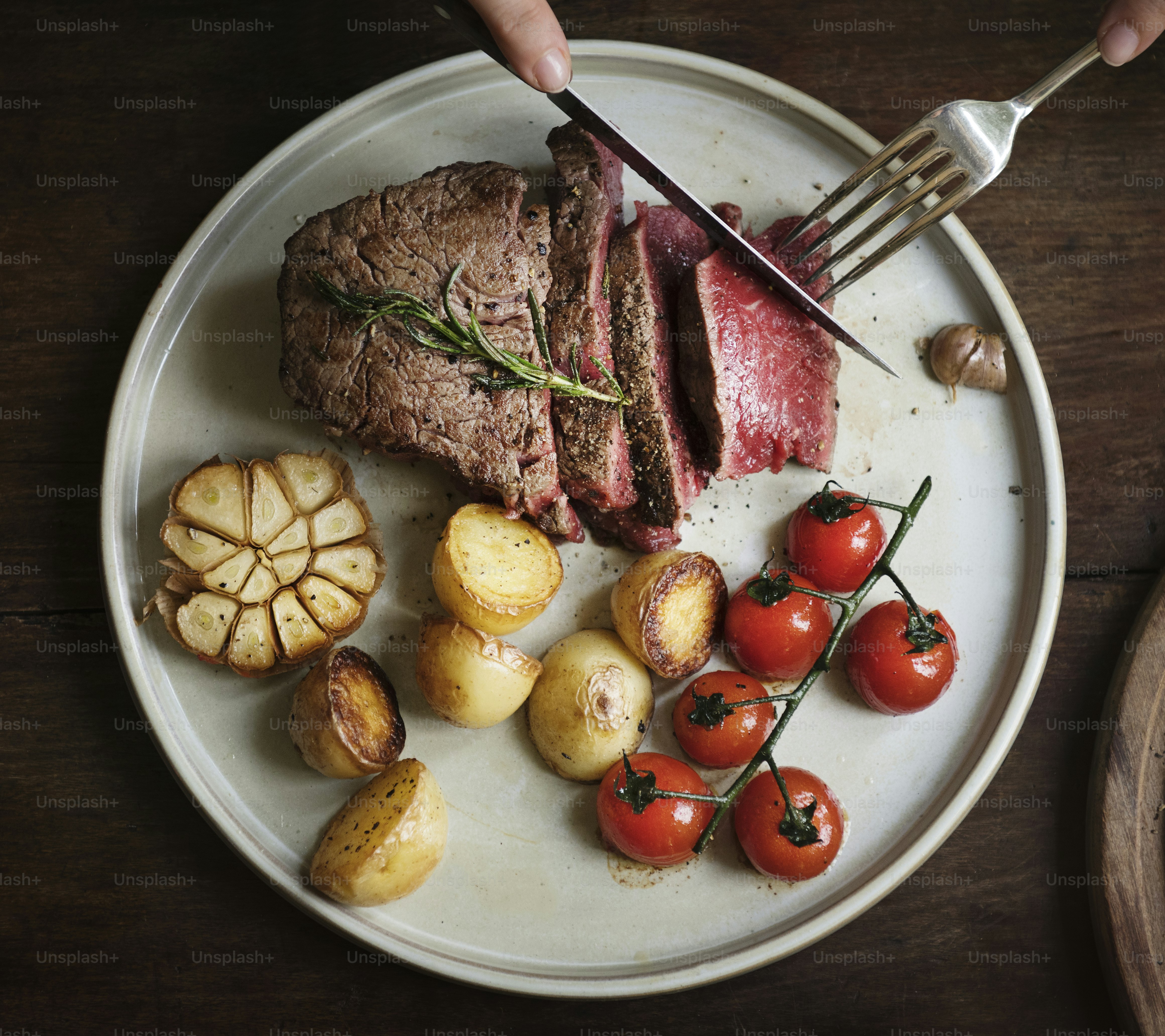 Close up of a cutting a fillet steak food photography recipe idea photo ...