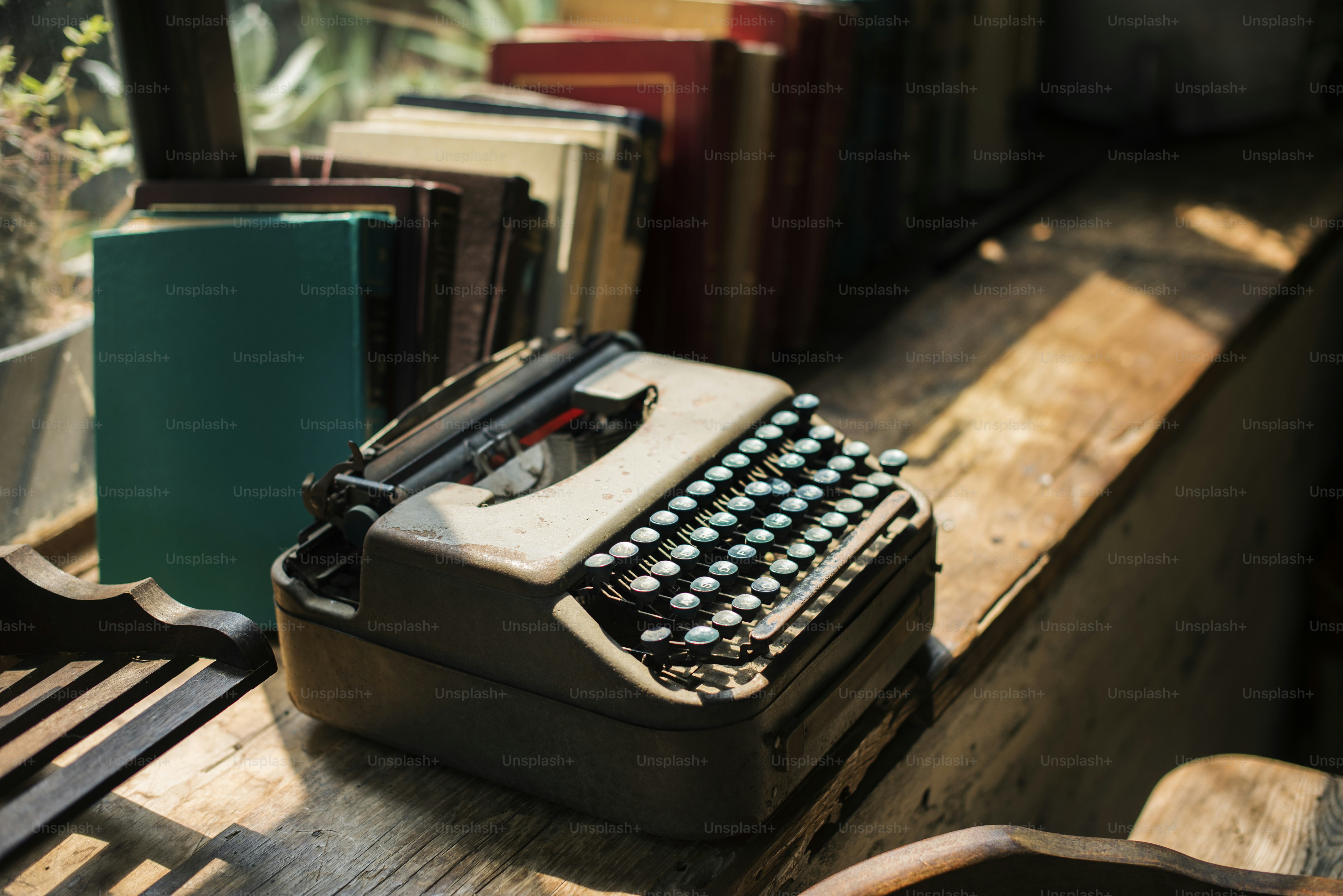 Closeup of retro typewriter on wooden table
