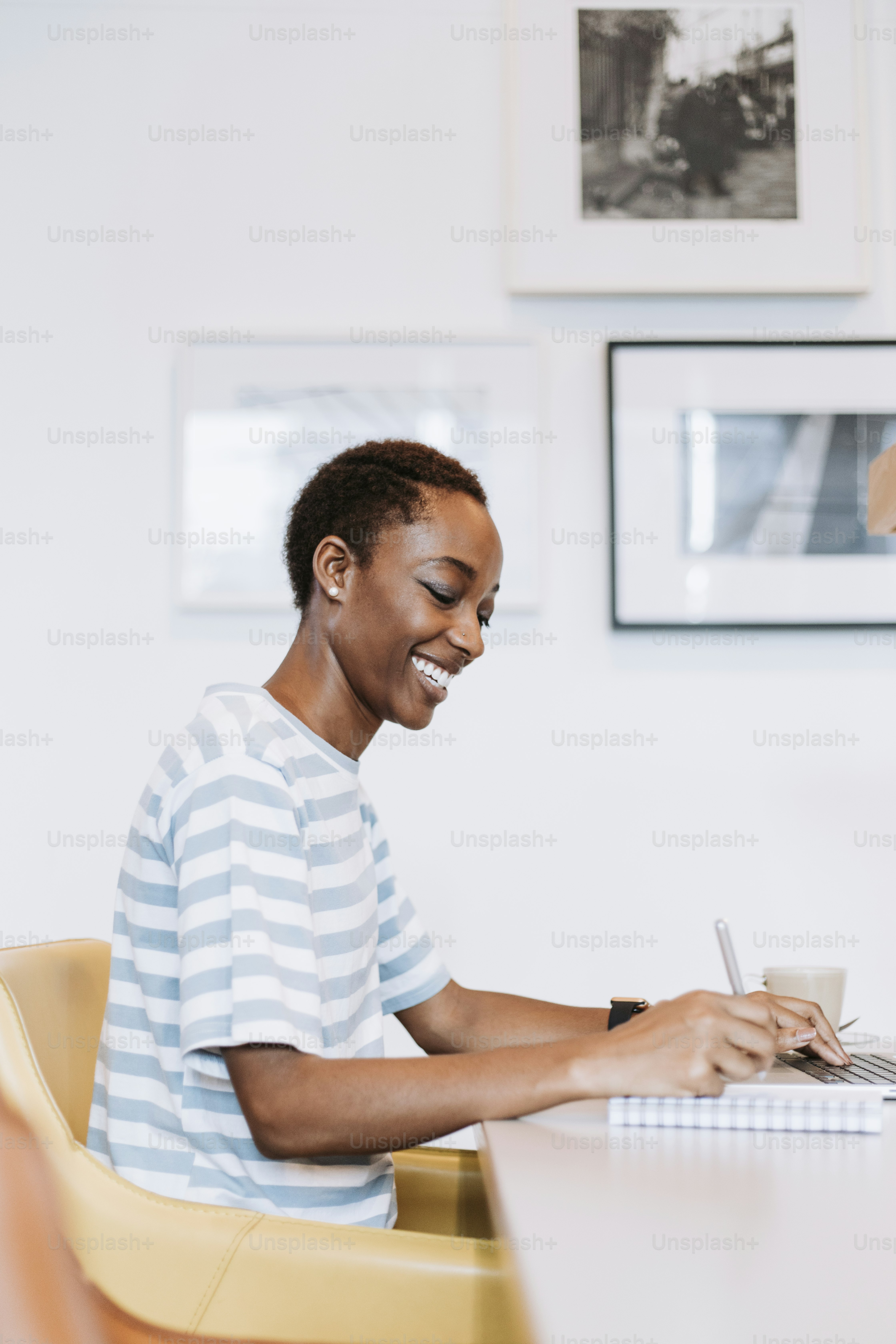 Black lady taking a note in a meeting