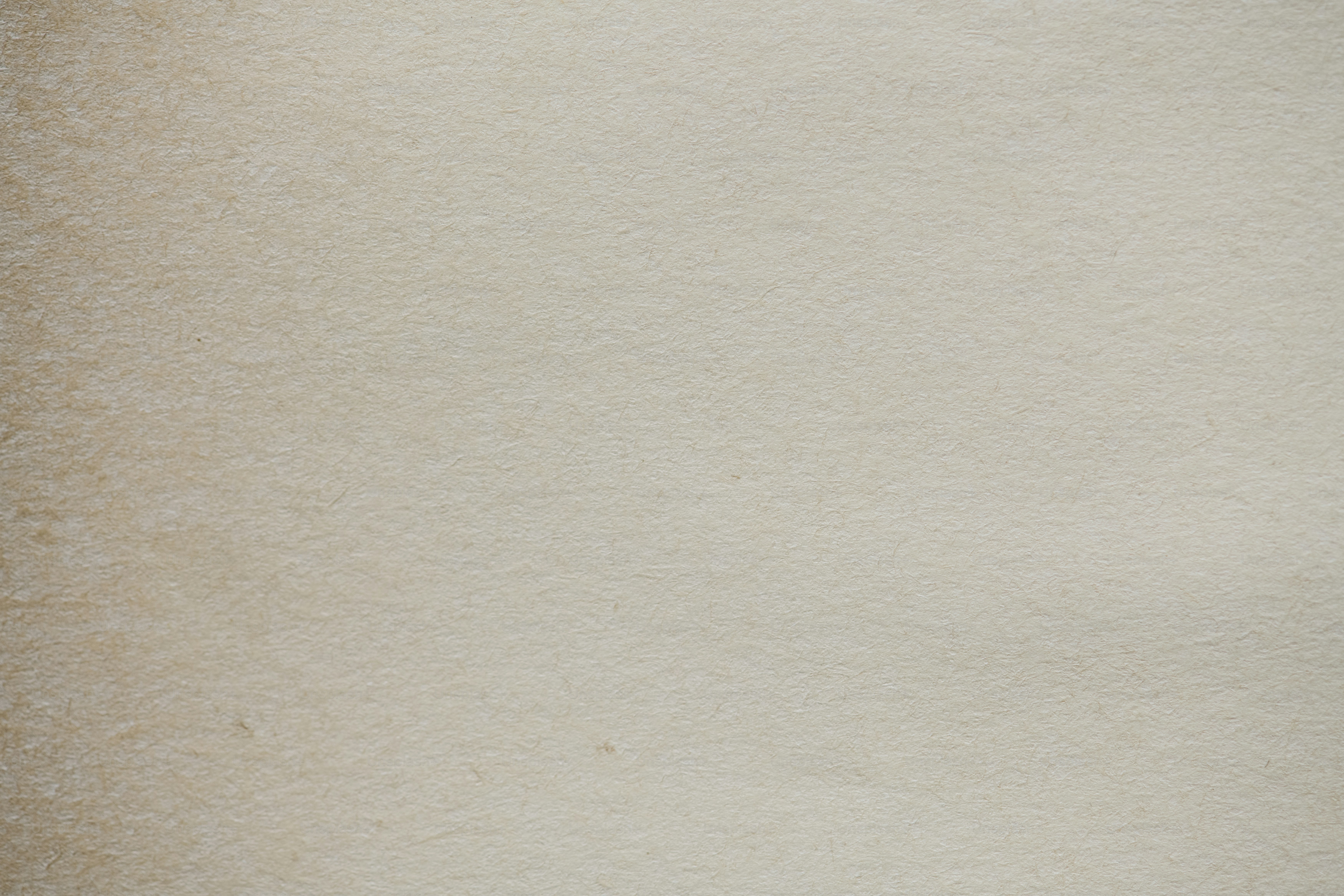 Beige, strukturierter Papierhintergrund