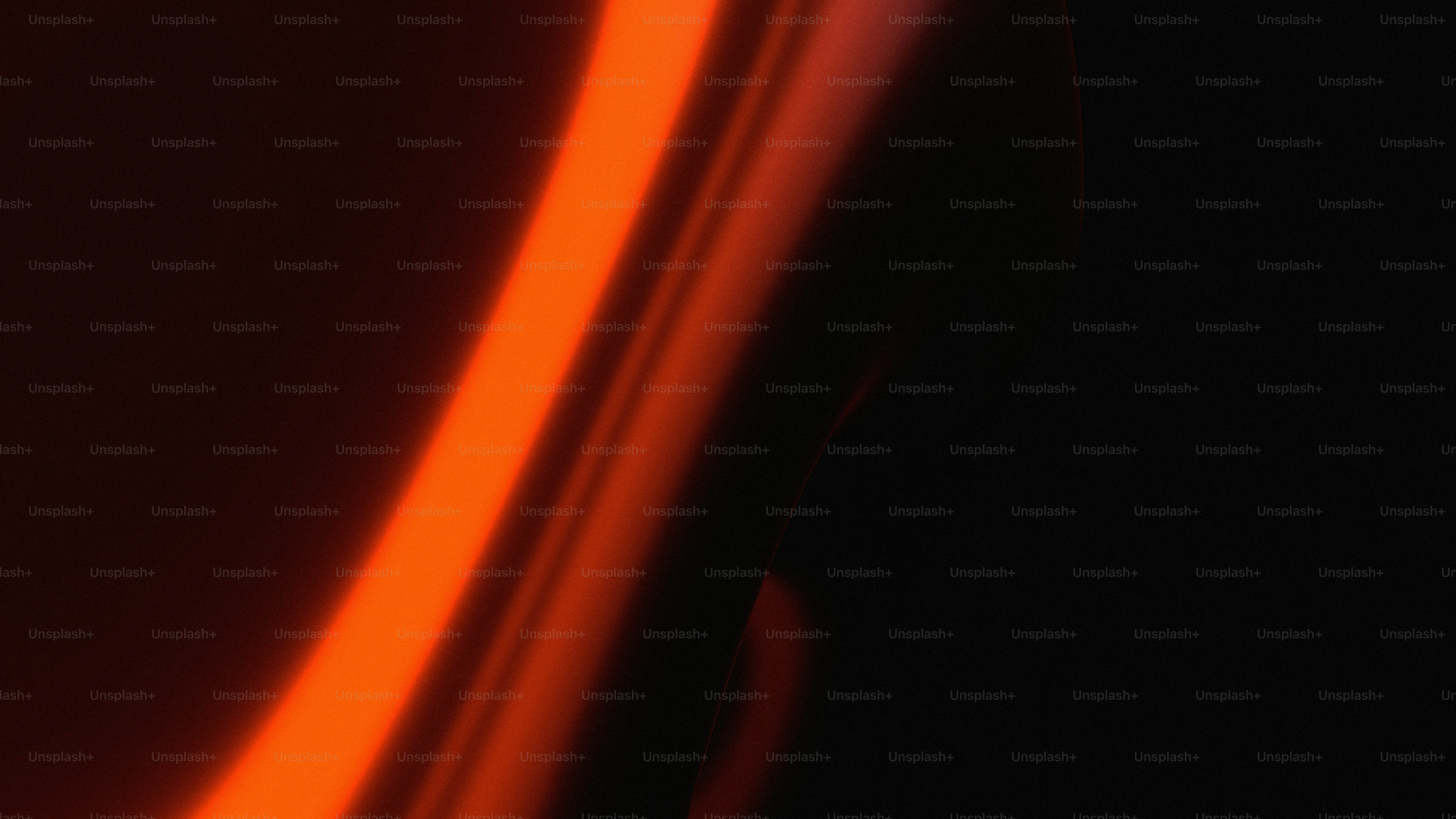 Abstract glowing orange lines on black background