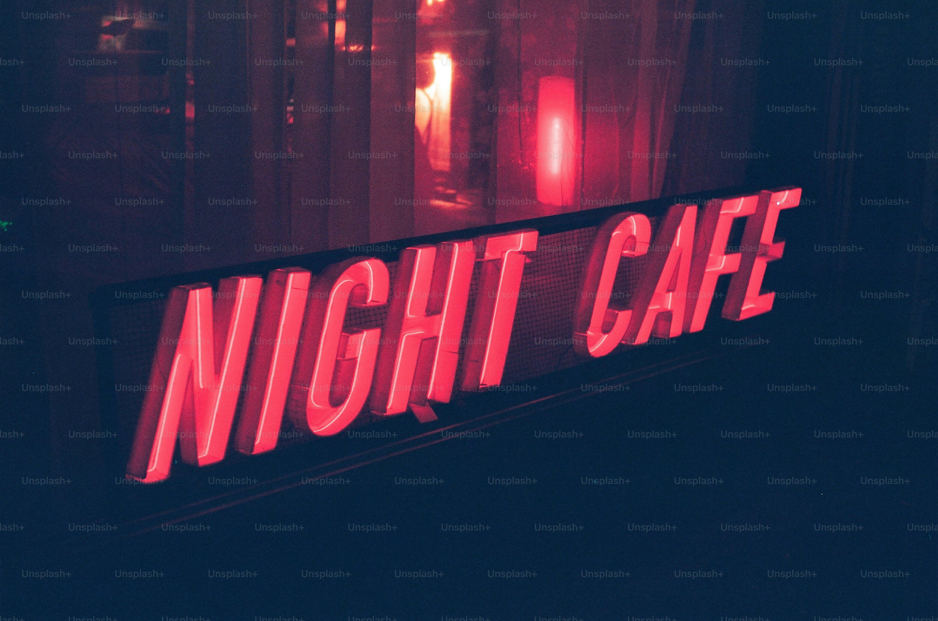 Red neon sign for night cafe at night