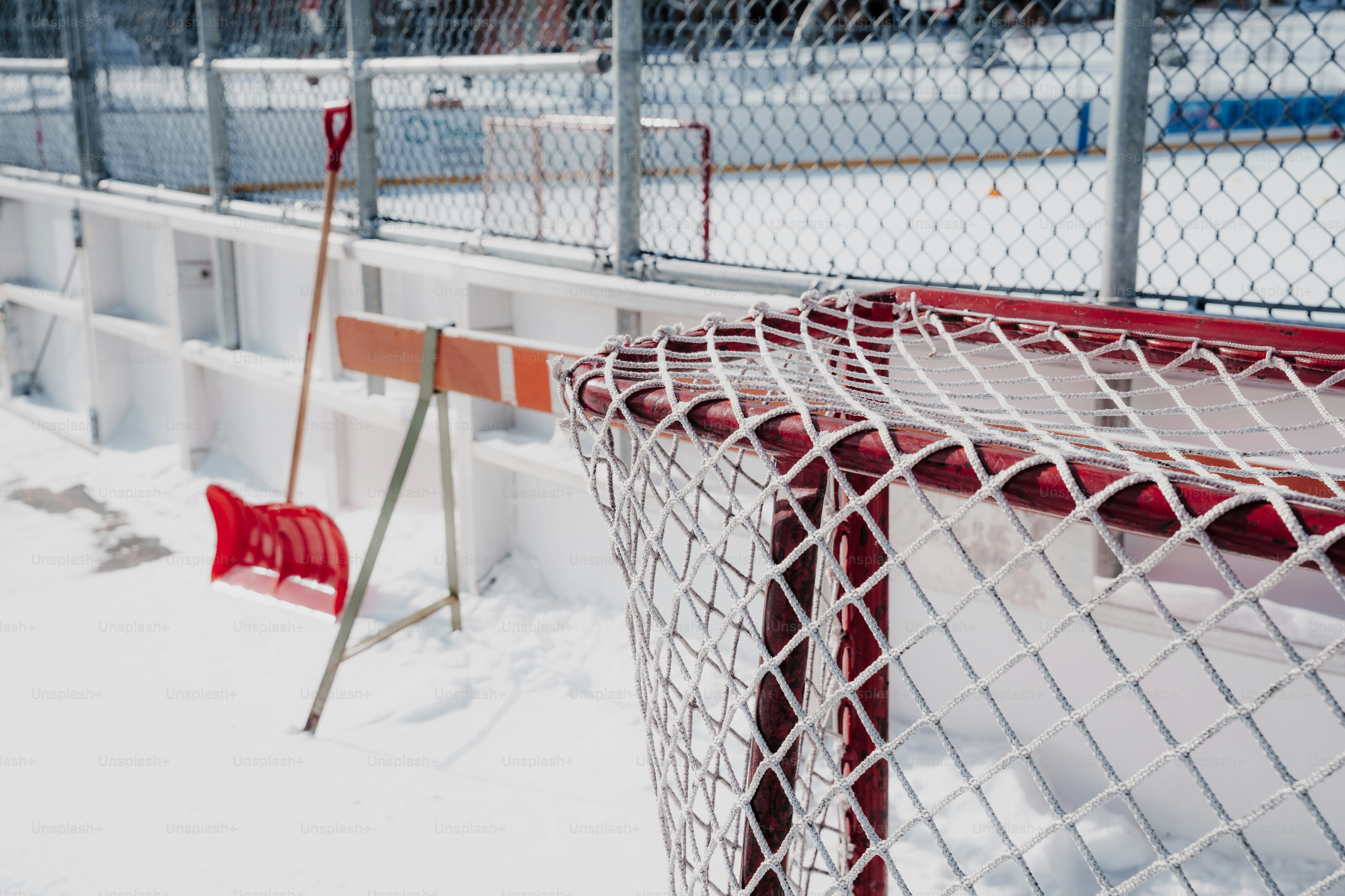 Empty hockey net on a snowy ice rink photo – Hockey Image on Unsplash