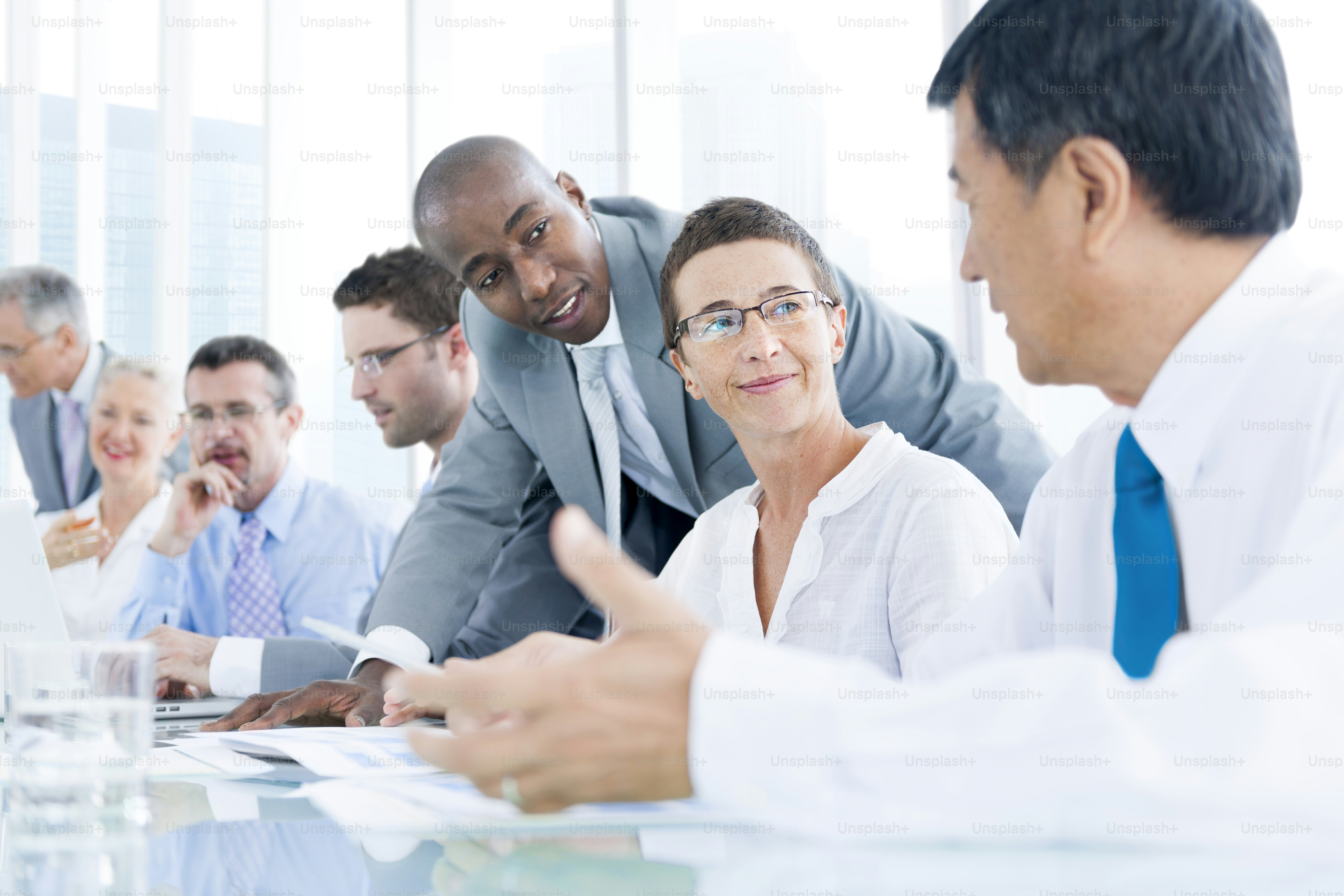 Diverse group of professionals collaborating in a modern office. photo ...
