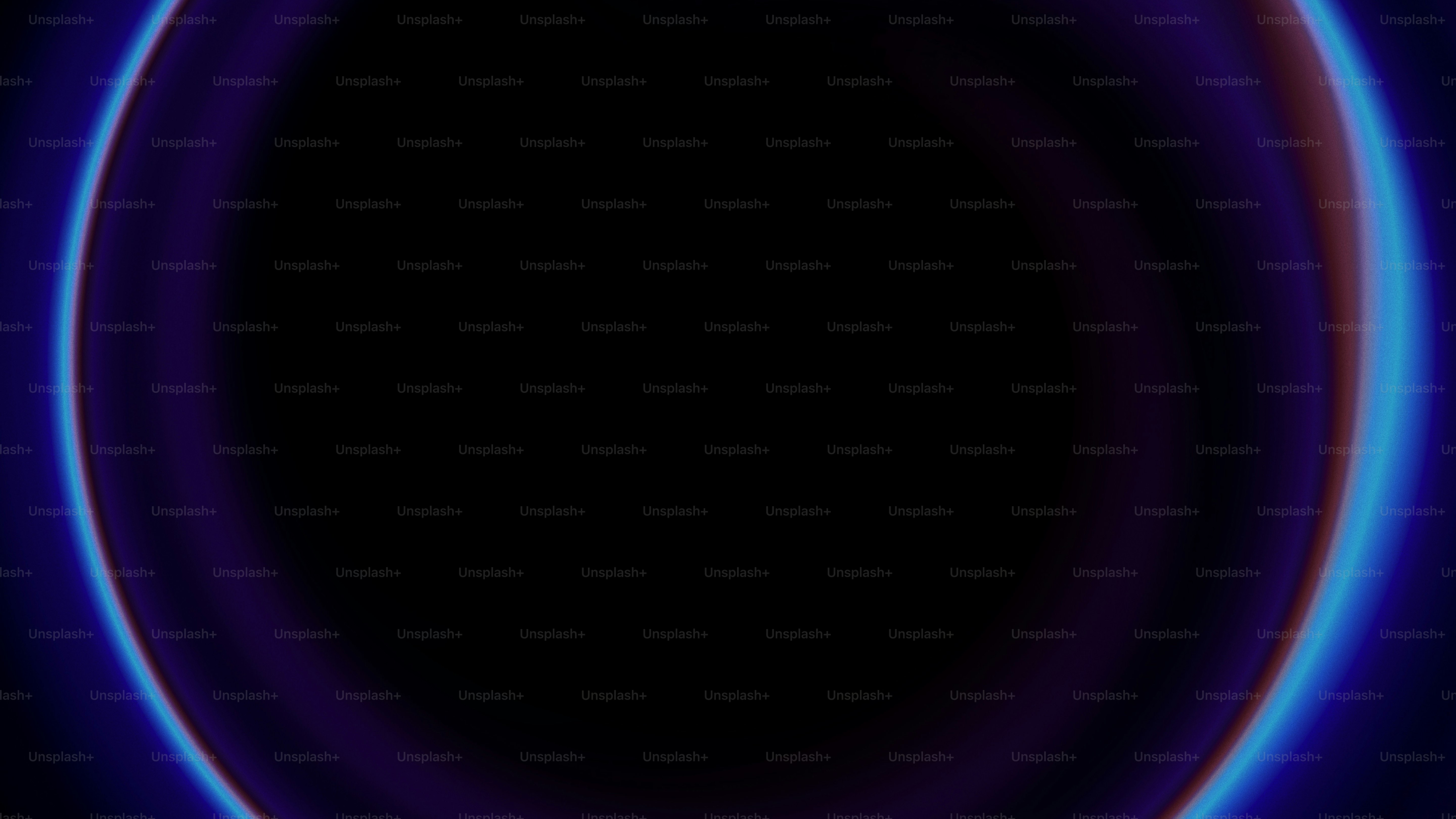 Abstract dark oval shape with blue glowing edges