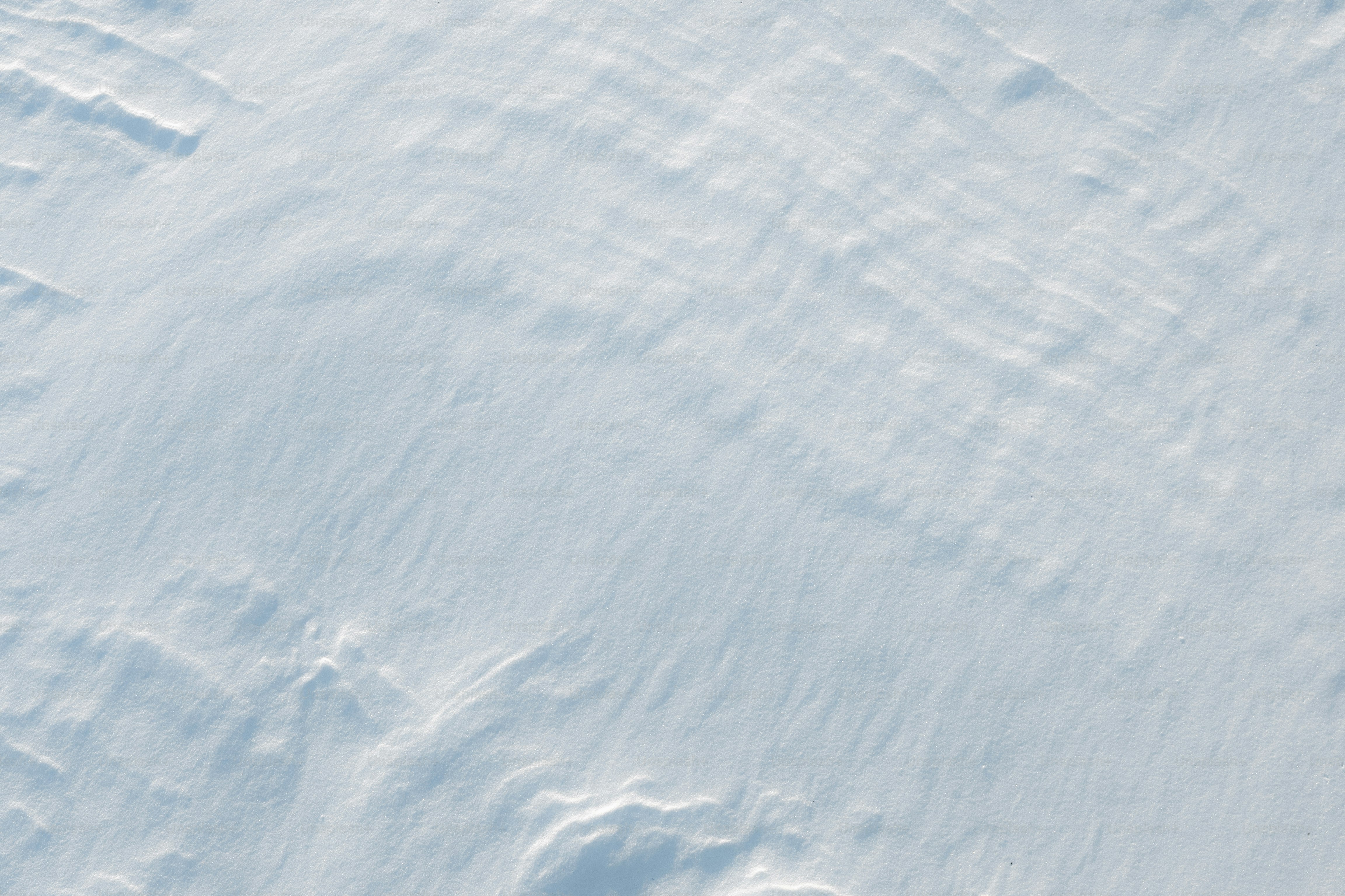 Abstract texture of wind-swept snow patterns photo – Background Image ...